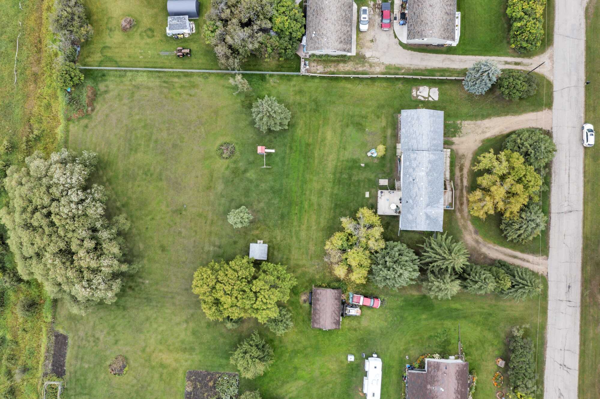 1.01 Acres ~ No Neighbours Behind ~ 3 Bed Bungalow ~ Double Detached Garage ~ Red Deer's Central Park Neighbourhood 5