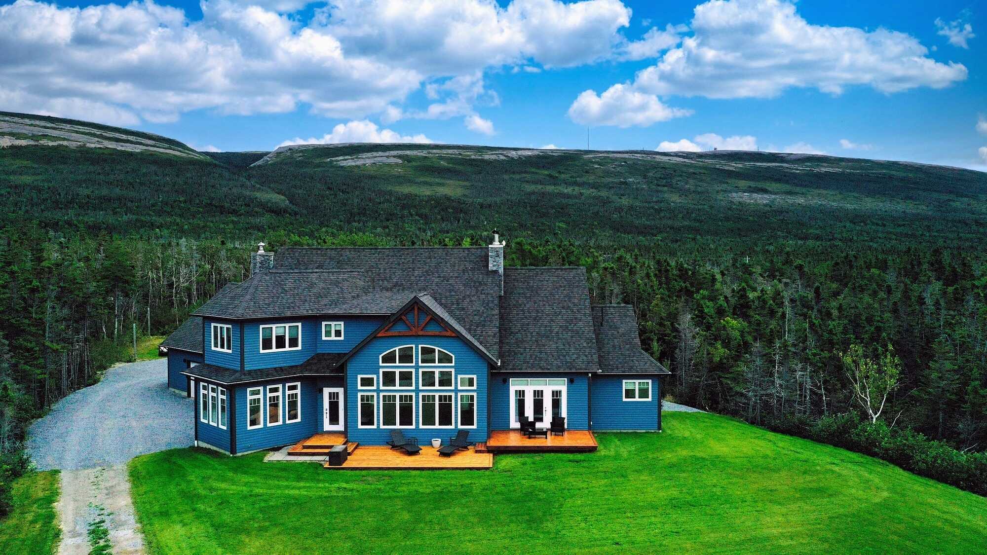 Welcome to this exquisite oceanfront executive home, where luxury meets sustainability. 4