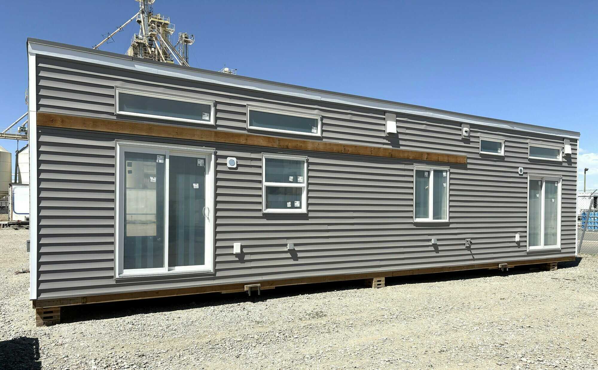 Brand New Modular Home –
(Foundation-style Tiny House) Never Lived In. Ground floor level bedrooms. 2