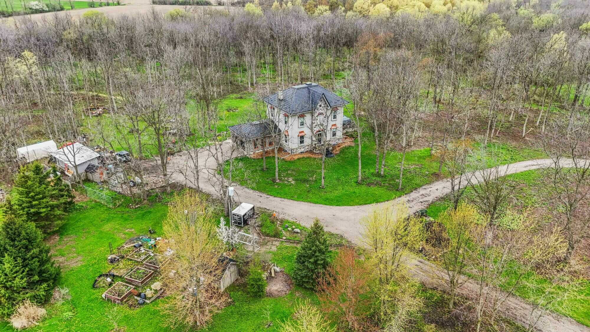 20.5-Acre Private Country Estate with Custom Luxury Home, Guest House & Endless Potential in North Middlesex - Close to London, Grand Bend and Strathroy. 2