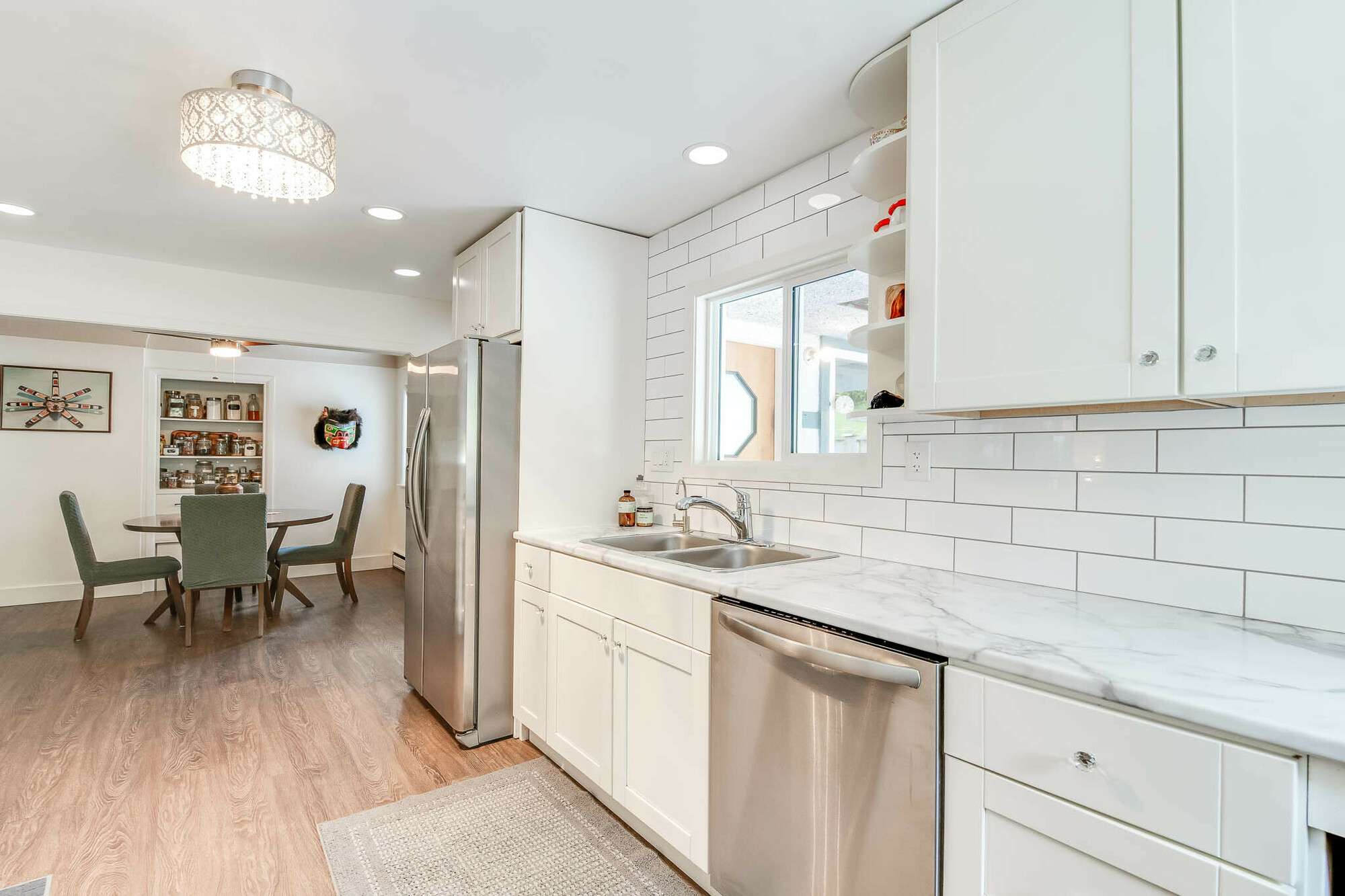 Just Listed ! Realtors welcome !  Inviting Home with Suite on a Large, Fenced Corner Lot ! Located in a quiet, family-friendly neighborhood, this 2,258 sq/ft home sits on a spacious 0.3-acre fully fenced corner lot. 5