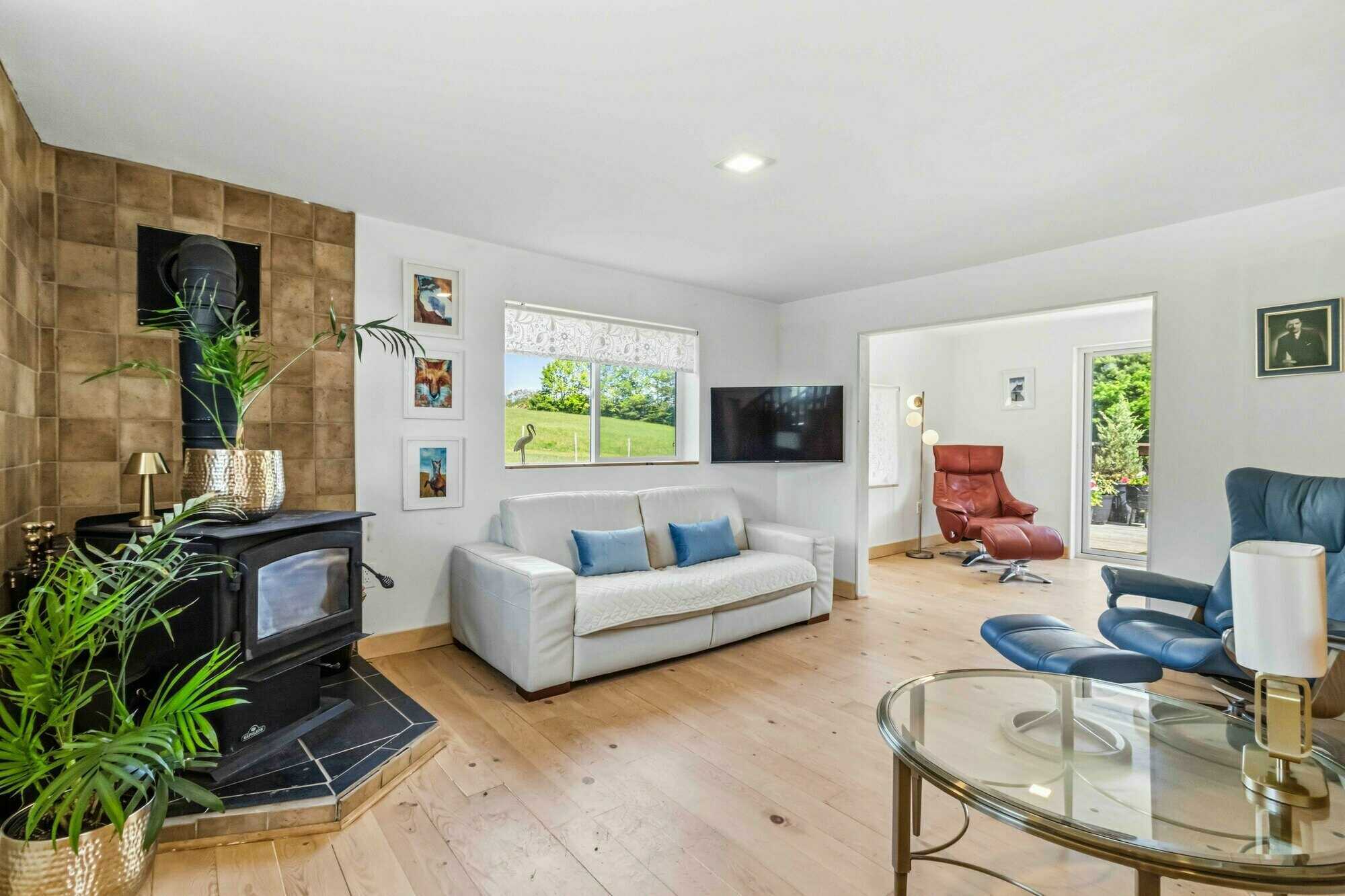 This amazing farmhouse on 2.1 peaceful acres has been completely modernized . 4
