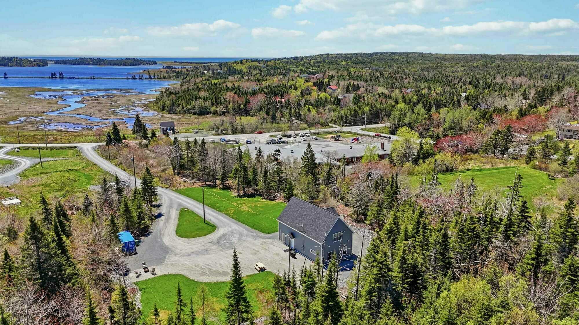Modern Coastal Living on 2.3 Private Acres | Ocean Views | 4 Bedrooms | One Year Old Home with Approved Second Septic and Future Development Potential 2