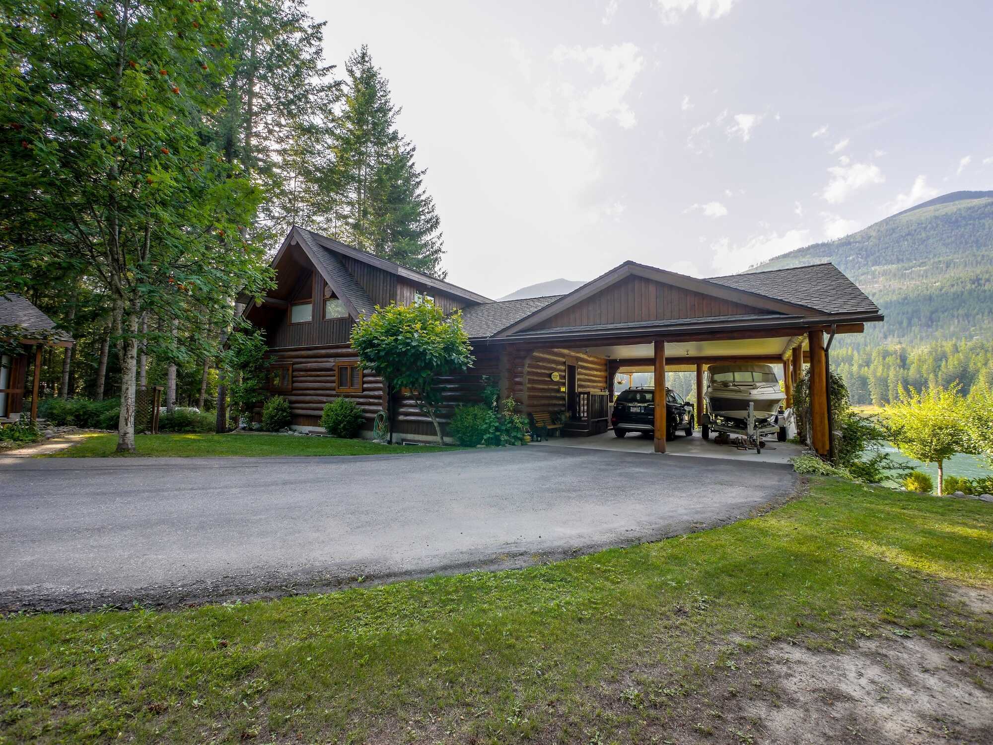 Spectacular WATER FRONT property with private beach for sale on the shores of Kootenay Lake in Procter BC. 2
