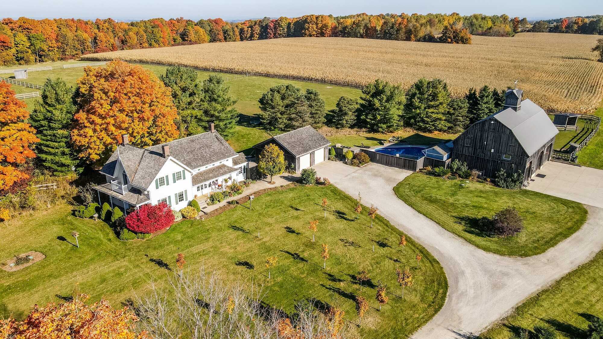Charming Century Home on over 95 acres. The home has undergone extensive renovations along with the addition of an inground pool and landscaping. Full barn with an apartment, chicken coop for fresh eggs, horse run-ins and over 40 acres of farm land. 2