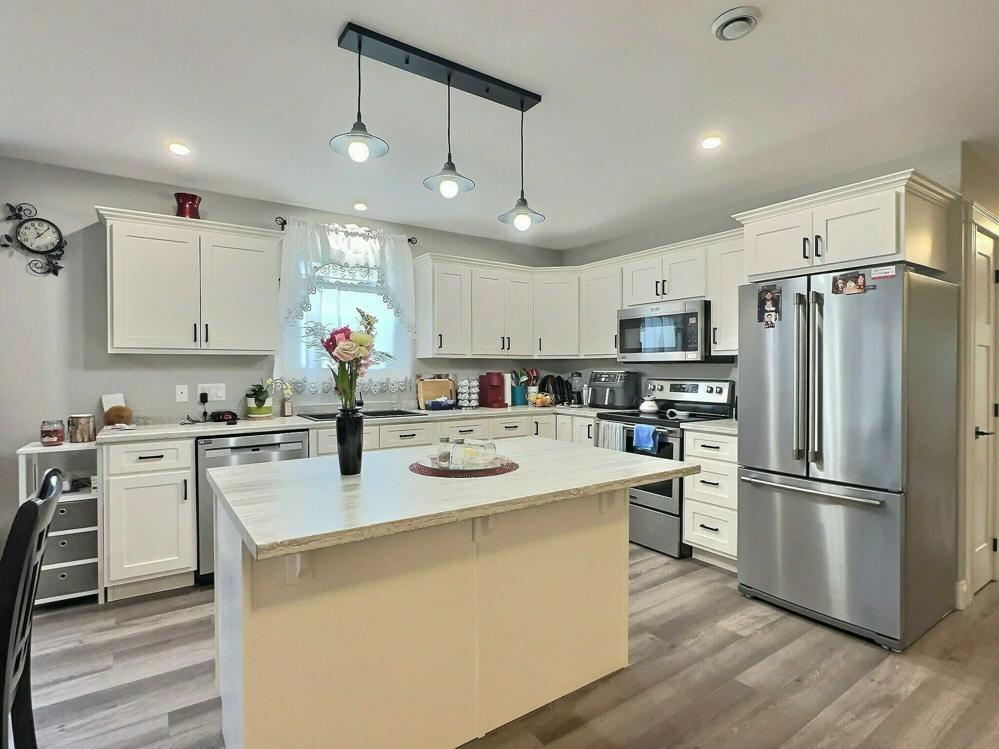 Perfect for retirees or those looking to downsize, this beautiful 2-bedroom semi-detached home with attached garage is located in a sought-after 55+ neighborhood! 2