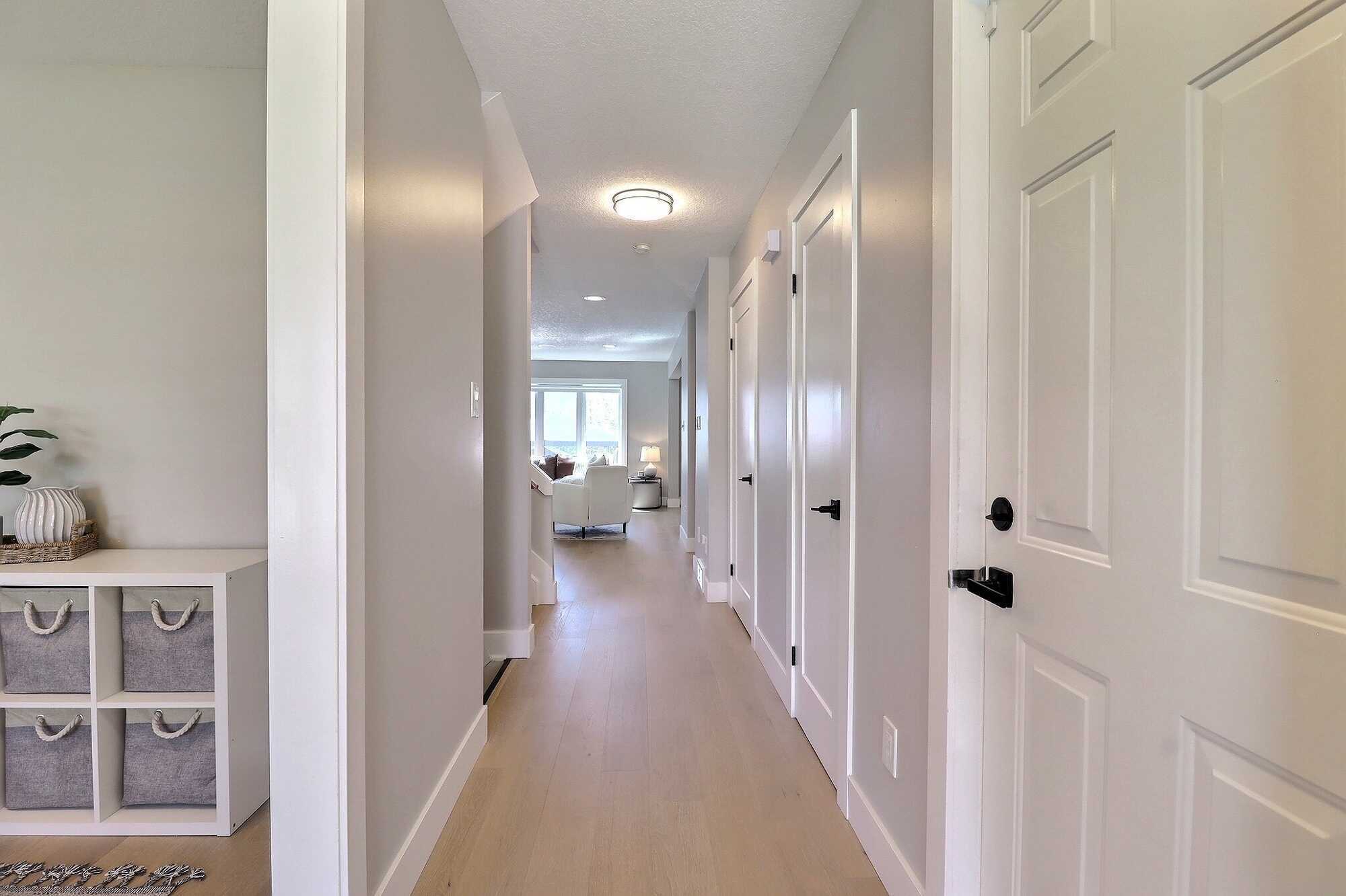 Beautifully Renovated 2-Storey Family Home in Copperfield Estates with Designer Kitchen, Sun-Filled Living & Finished Basement! 2
