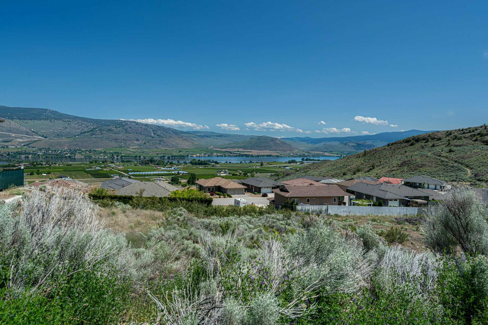 Build your dream home on this .284 acre lot overlooking the Osoyoos Golf Course with breathtaking VIEWS of the lake, mountains & downtown Osoyoos! 5