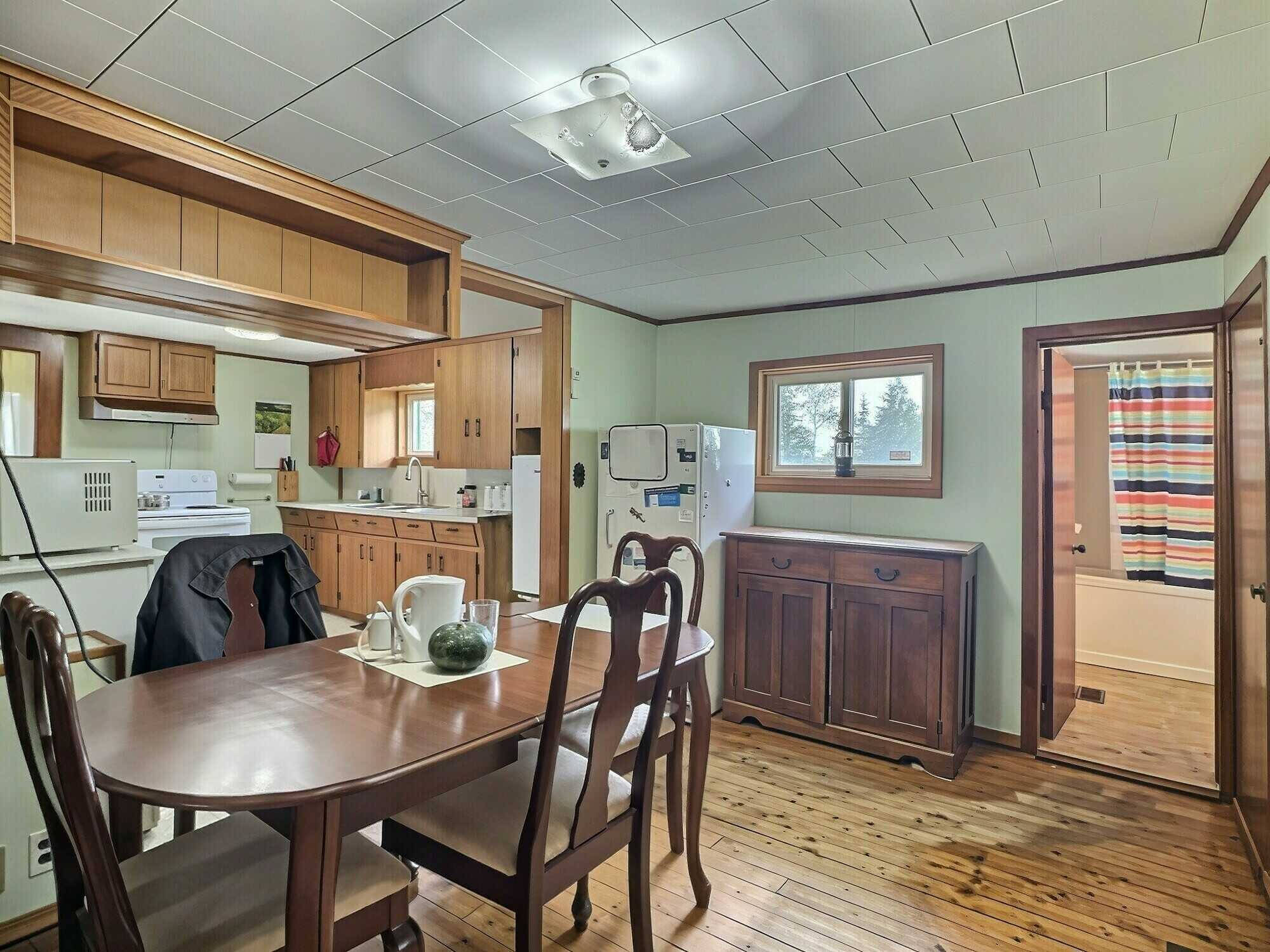 Bring your vision and restore the charm of this century home set on 11 beautiful acres of peaceful countryside! 4