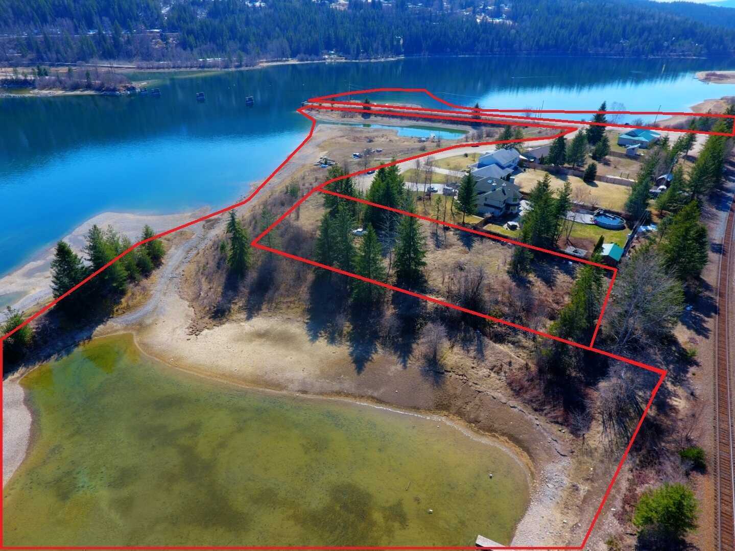 FIRST TIME ON THE MARKET!! Over 12 Acres of land across from the shores of the Kootenay River! 2