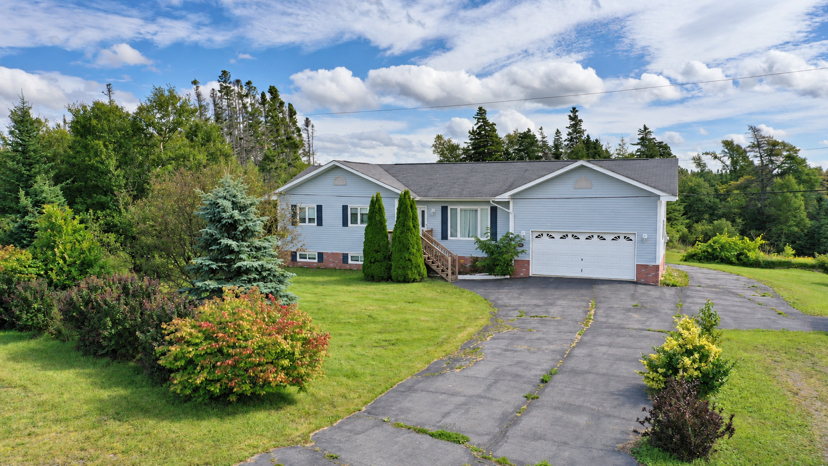 Space to relax, room for your hobbies, and a beautiful setting in scenic Robinsons! 2