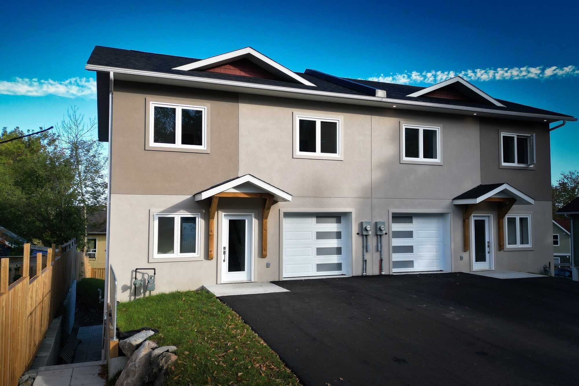 Brand new 3 + 2 Bedroom, 4 bath, semi-detached home with finished walkout legal 2nd unit apartment in lower level. 2