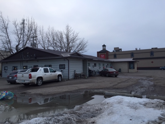 Former clinic building renovated into 18 bed rooming house. 2
