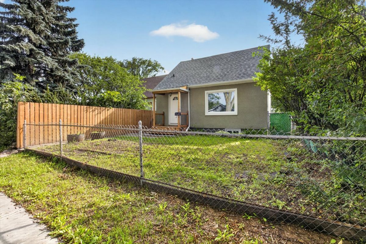 COMPLETELY RENOVATED FROM TOP TO BOTTOM, this 1.5-storey, 4-bedroom, 2-bathroom home is located in the quiet Alberta Avenue neighbourhood. 5