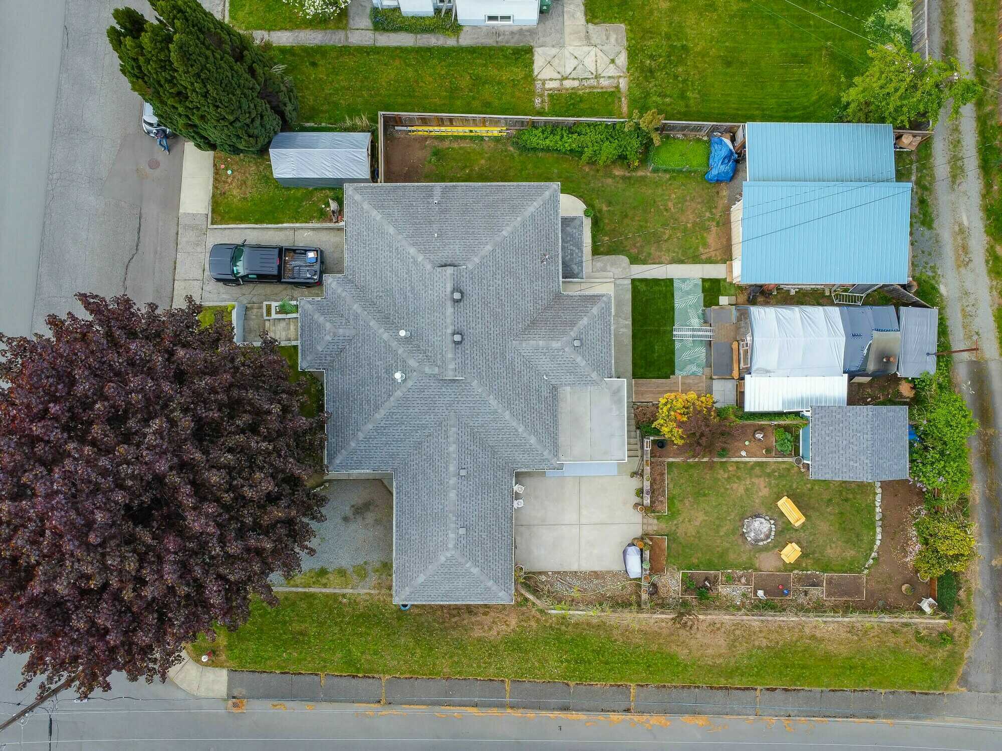 Just Listed ! Realtors welcome !  Inviting Home with Suite on a Large, Fenced Corner Lot ! Located in a quiet, family-friendly neighborhood, this 2,258 sq/ft home sits on a spacious 0.3-acre fully fenced corner lot. 2