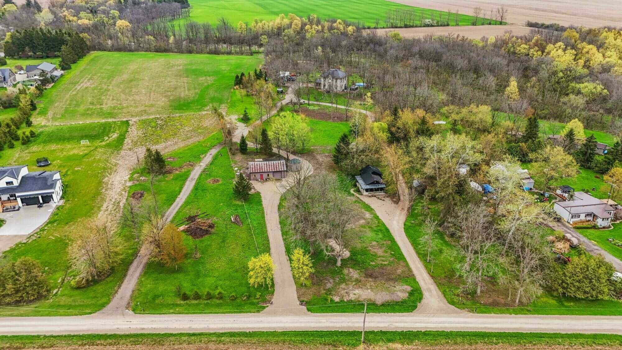 20.5-Acre Private Country Estate with Custom Luxury Home, Guest House & Endless Potential in North Middlesex - Close to London, Grand Bend and Strathroy. 3