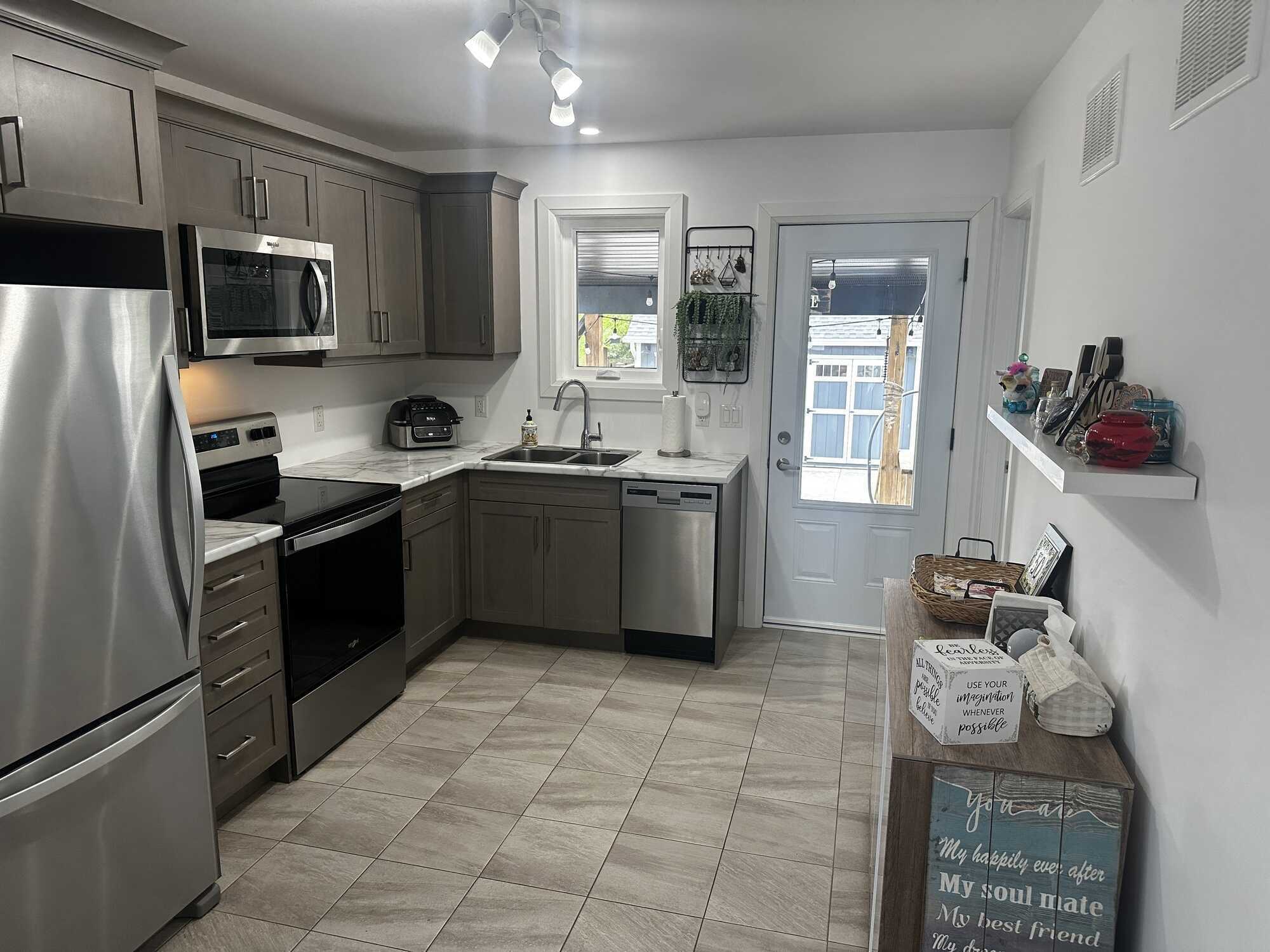 Stylish Tuxedo Home with Modern Design, Finished Basement 3