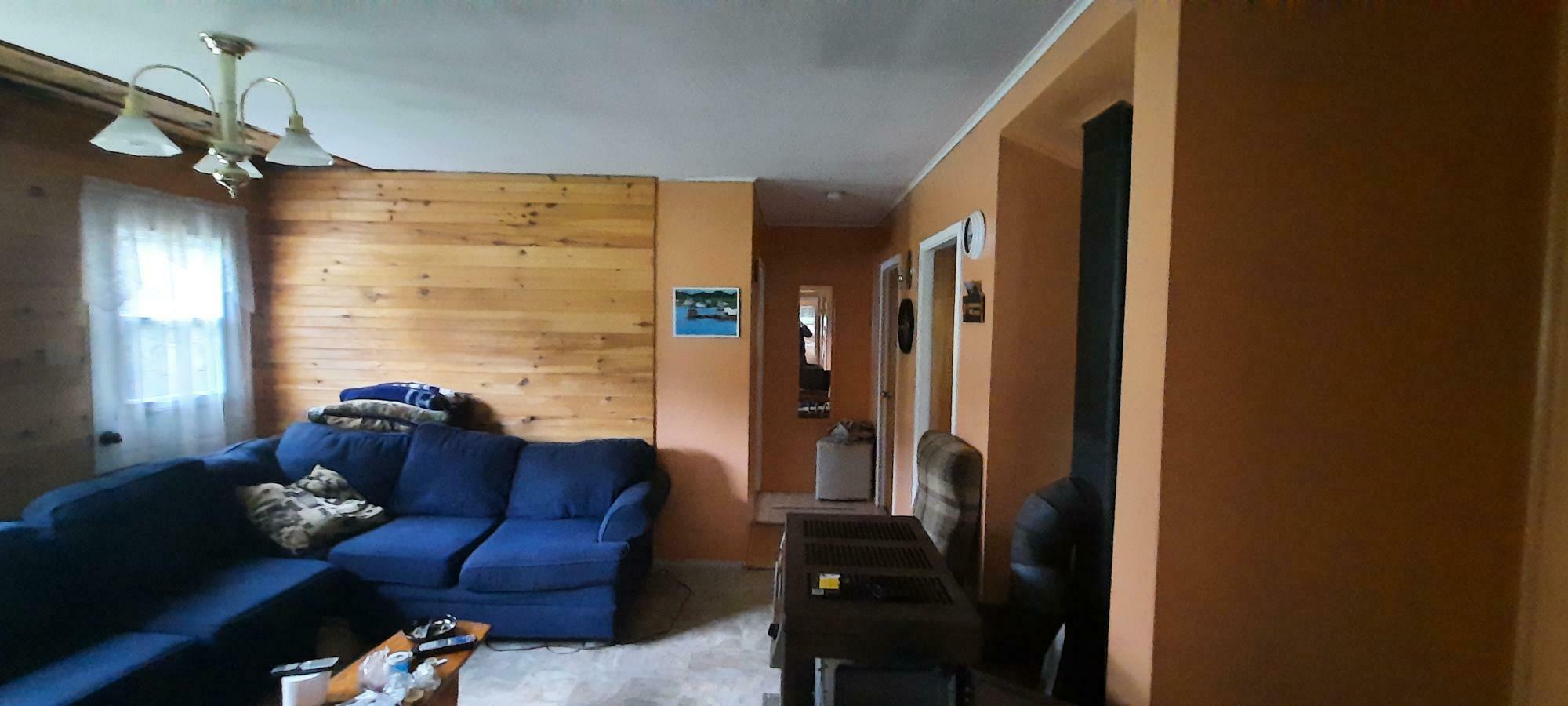 Cozy cabin next to Gros Morne National Park that needs a little interior work. 4
