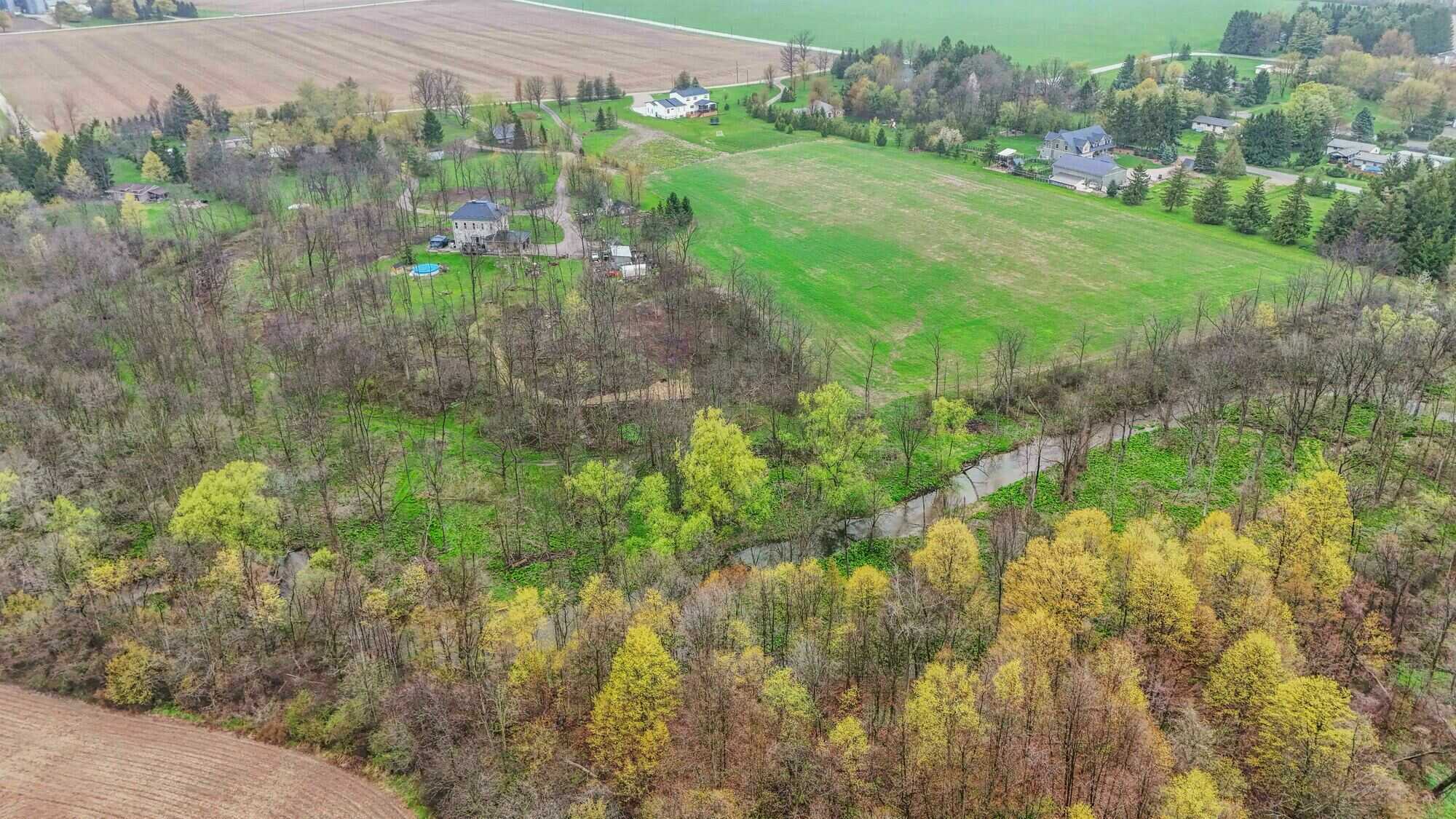 20.5-Acre Private Country Estate with Custom Luxury Home, Guest House & Endless Potential in North Middlesex - Close to London, Grand Bend and Strathroy. 5