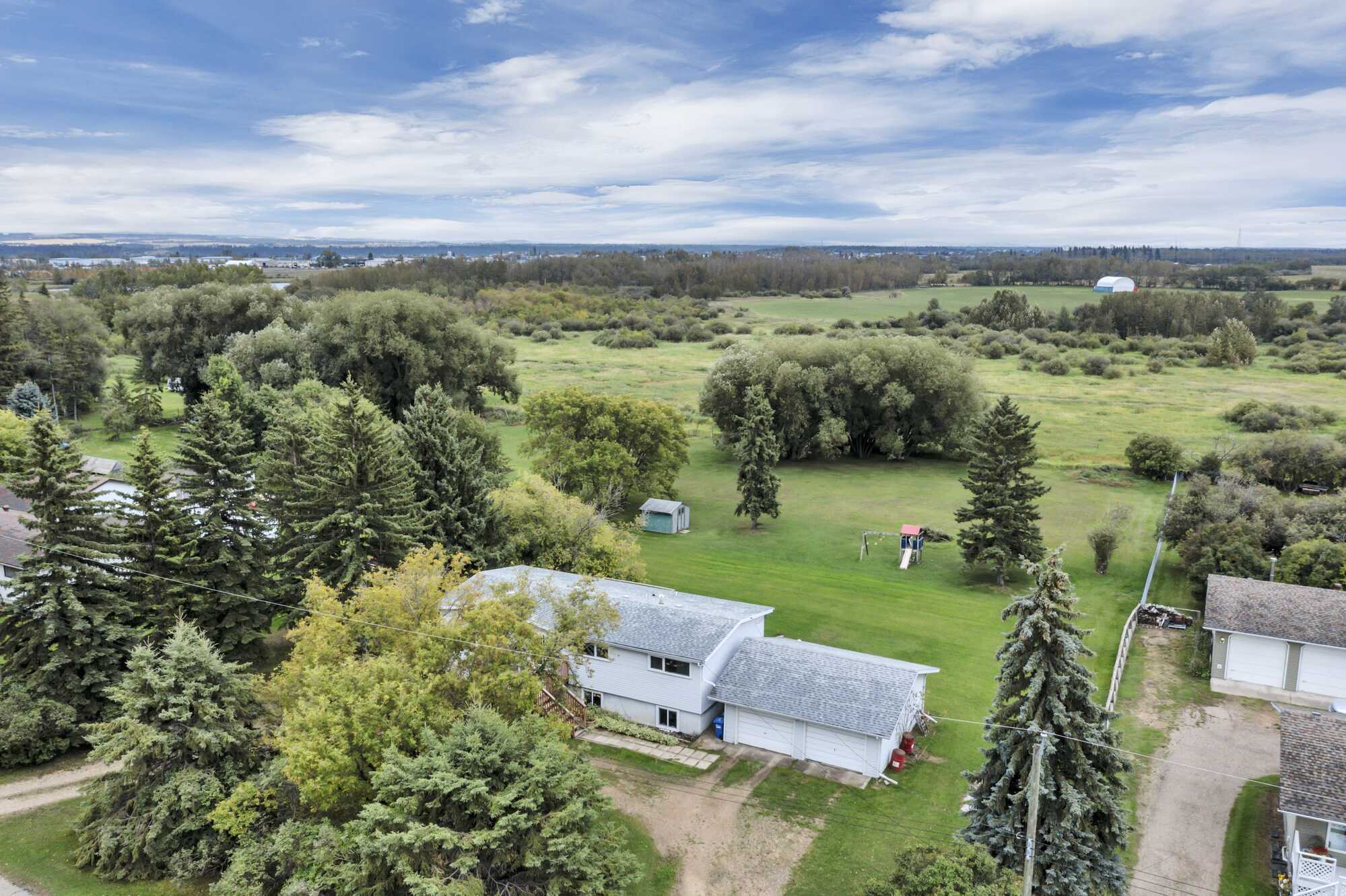1.01 Acres ~ No Neighbours Behind ~ 3 Bed Bungalow ~ Double Detached Garage ~ Red Deer's Central Park Neighbourhood 2