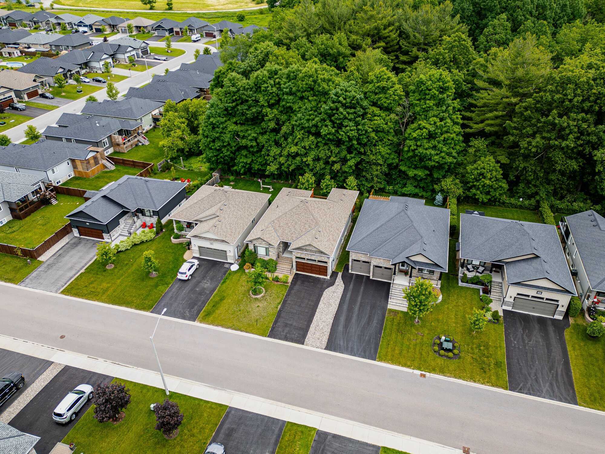 Executive Orchard Lane bungalow on a premium wooded lot! Offering 3+1 bedrooms, 3 baths, nearly 3,000 sq. ft. of finished living space, a custom kitchen, covered deck, finished basement, fenced backyard and an exceptional West Trenton location. 5