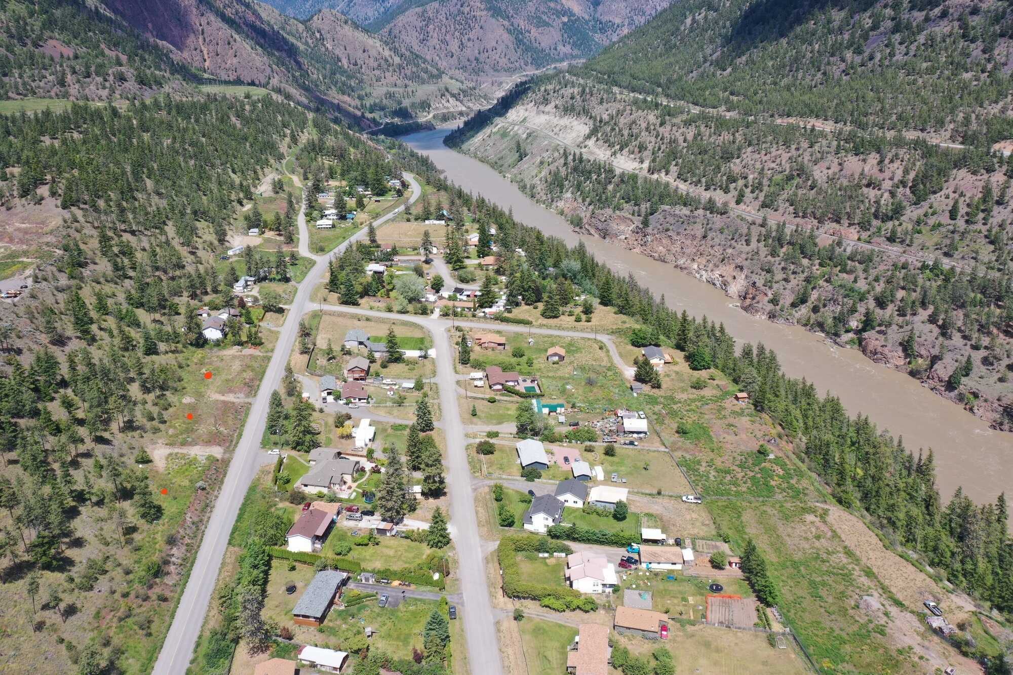 Developers alert !  Located in scenic Lillooet, along the upper Fraser River, this large 1 acre lot overlooking pure paradise awaits. Ready to build your dream home !! 3