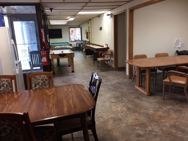 Former clinic building renovated into 18 bed rooming house. 5