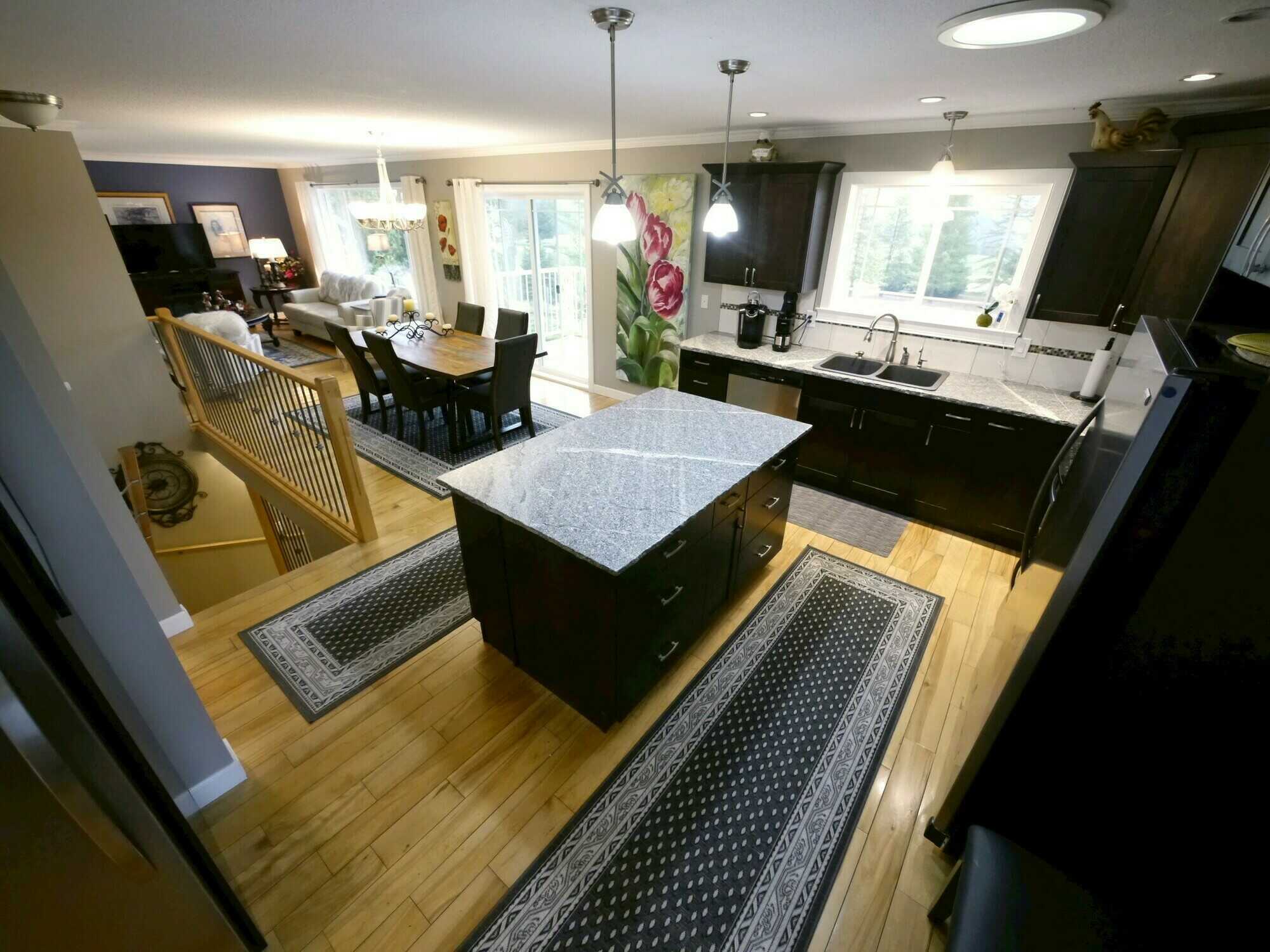 Boasting breathtaking views, this immaculate move in ready 3 bed 2 bath home will impress even the most discerning buyer. Hardwood flooring, tastefully finished and decorated on 1.77 acres with double detached garage, carport and more! 3