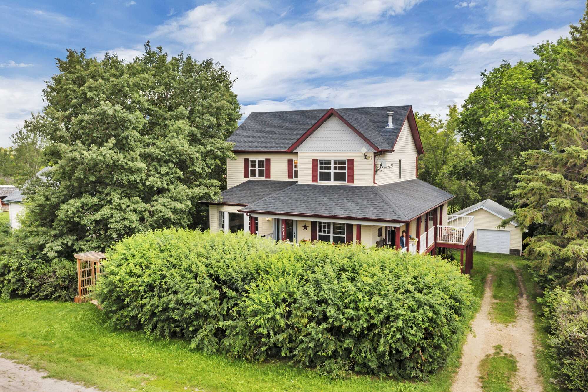 Timeless Character ~ Modern Comfort ~ 2-Storey ~ Six Bedrooms ~ Double Detached Garage ~ Private, Park-Like Setting 4