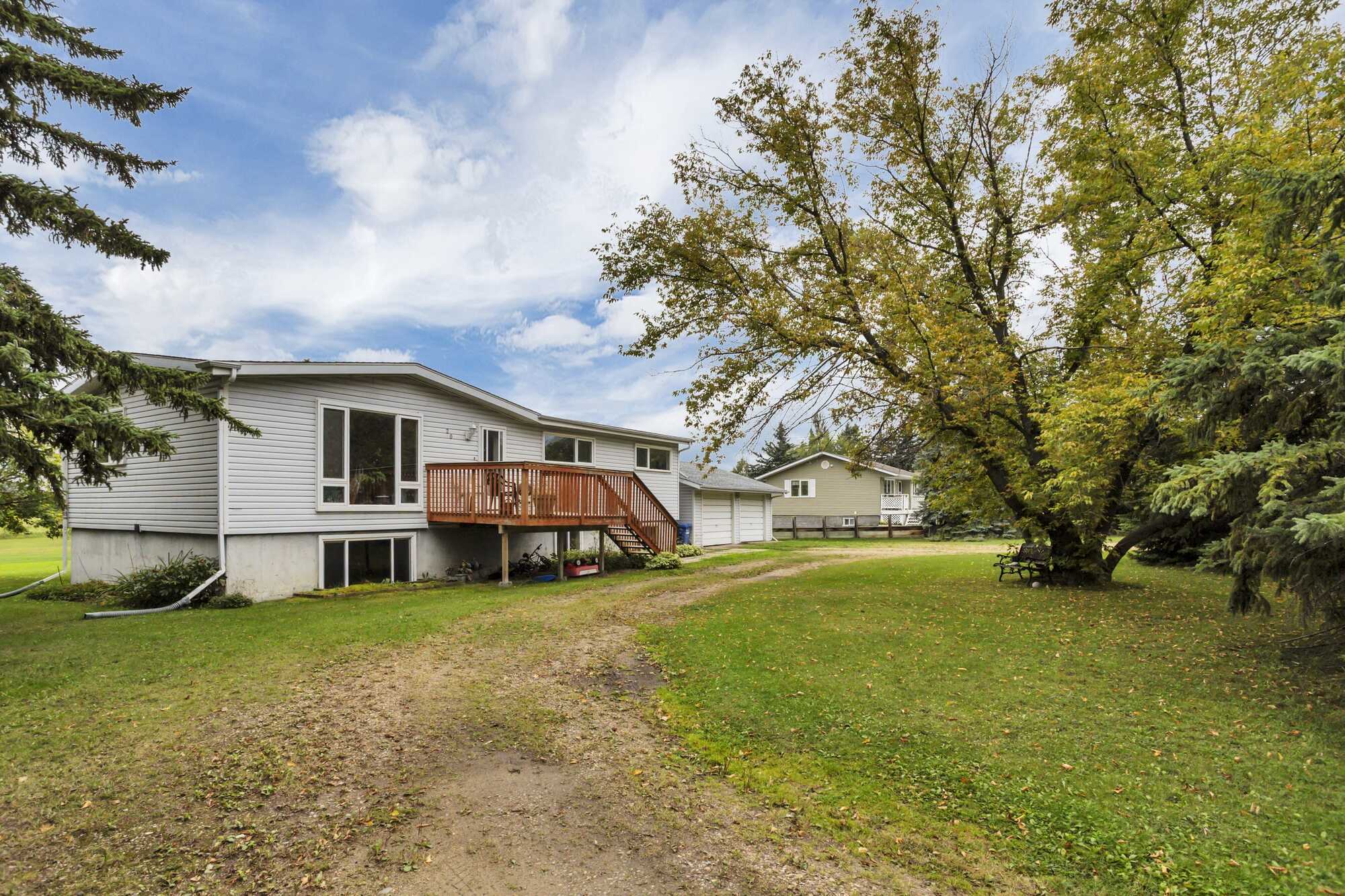 1.01 Acres ~ No Neighbours Behind ~ 3 Bed Bungalow ~ Double Detached Garage ~ Red Deer's Central Park Neighbourhood 3