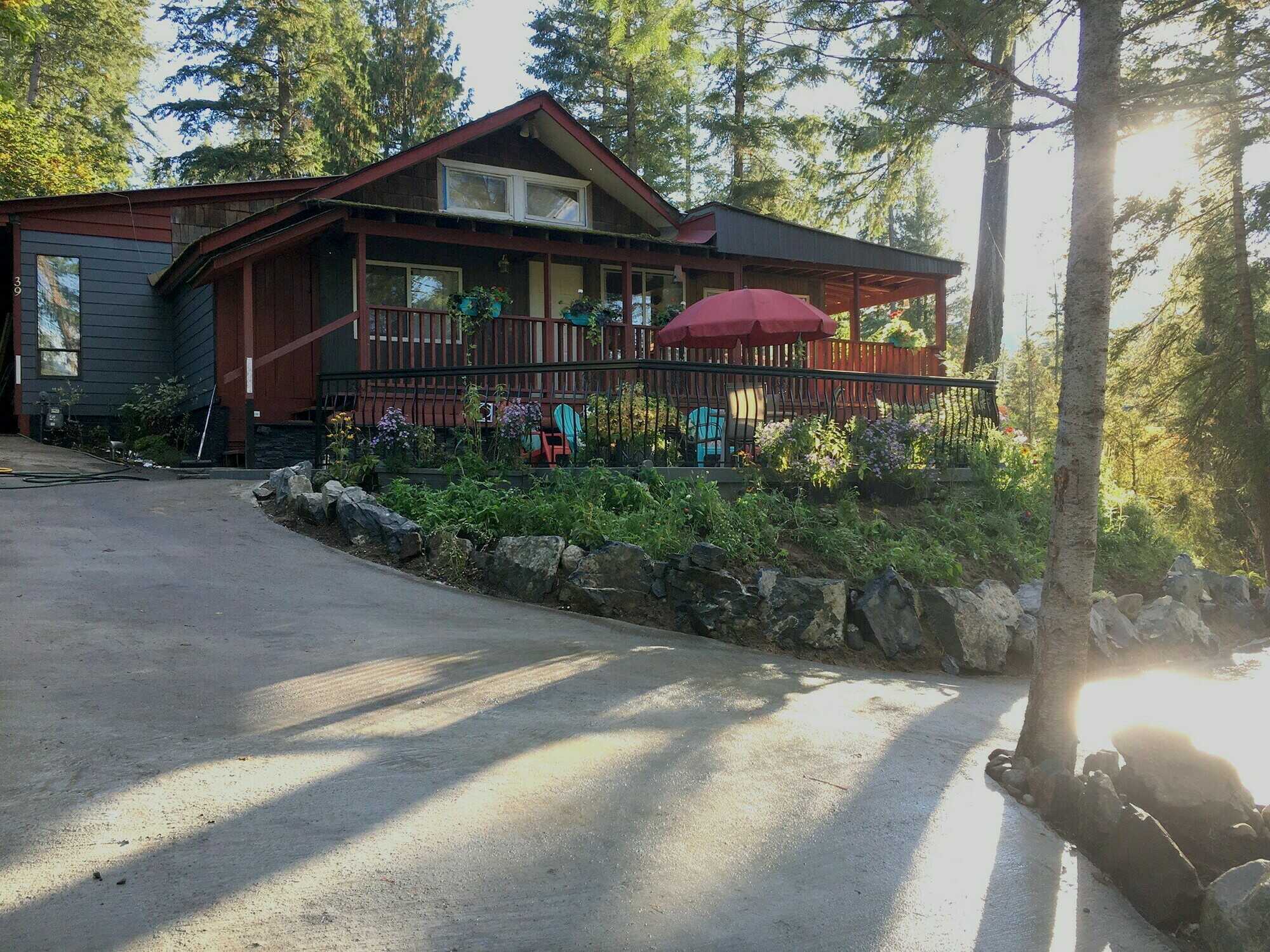 View of Christina Lake from this Fantastic Duplex Home! Each unit is 3Bed-1Bath!  Excellent Opportunity for Anyone! Potential Air BnB! Great location in a family friendly neighbourhood!  ASK ABOUT VENDER FINANCING!! 4