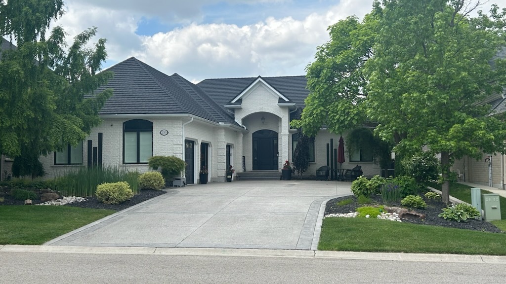 Executive Sunningdale Ranch with Backyard Oasis & Triple Heated Garage!
Loads of Updates — Nothing to do but Move In! 3