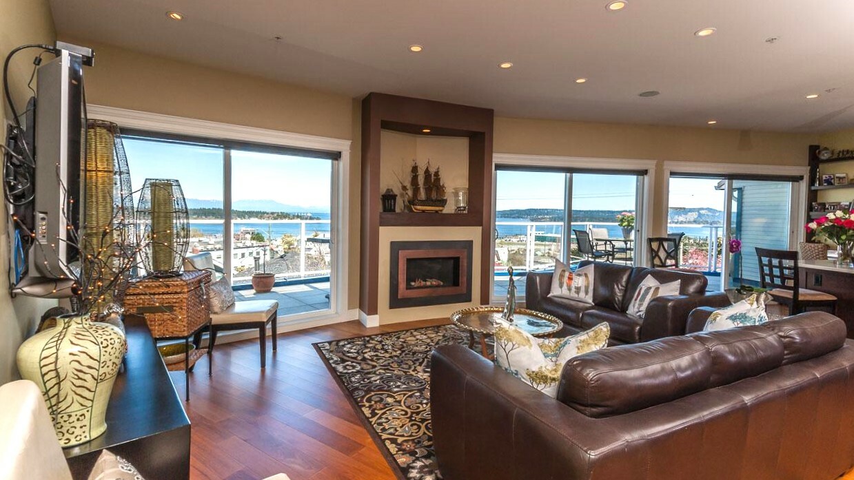 PRICED TO SELL  ! Westcoast living at its most luxurious ! Elegant 1858 sq.ft Penthouse overlooking the stunning harbour & coastal mountains. This home features two large decks for outdoor entertaining one facing the mountains; the other the ocean. 4