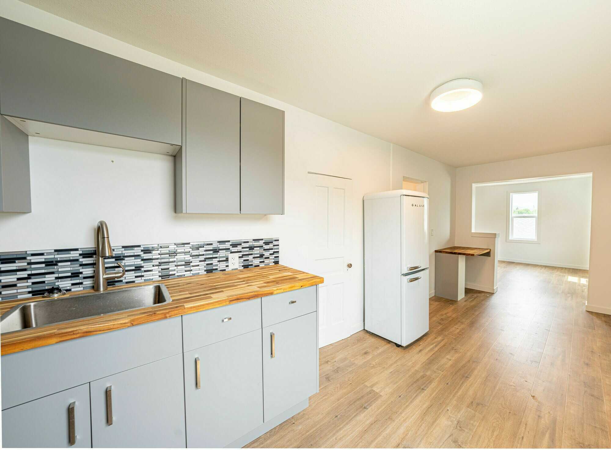 Incredible investment opportunity! Renovated 5 plex in central location, walking distance to town, with outstanding income. 5