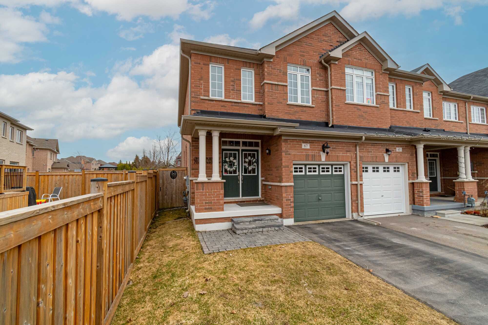 Immaculate End Unit Townhouse with Stylish Upgrades in Prime Location 2