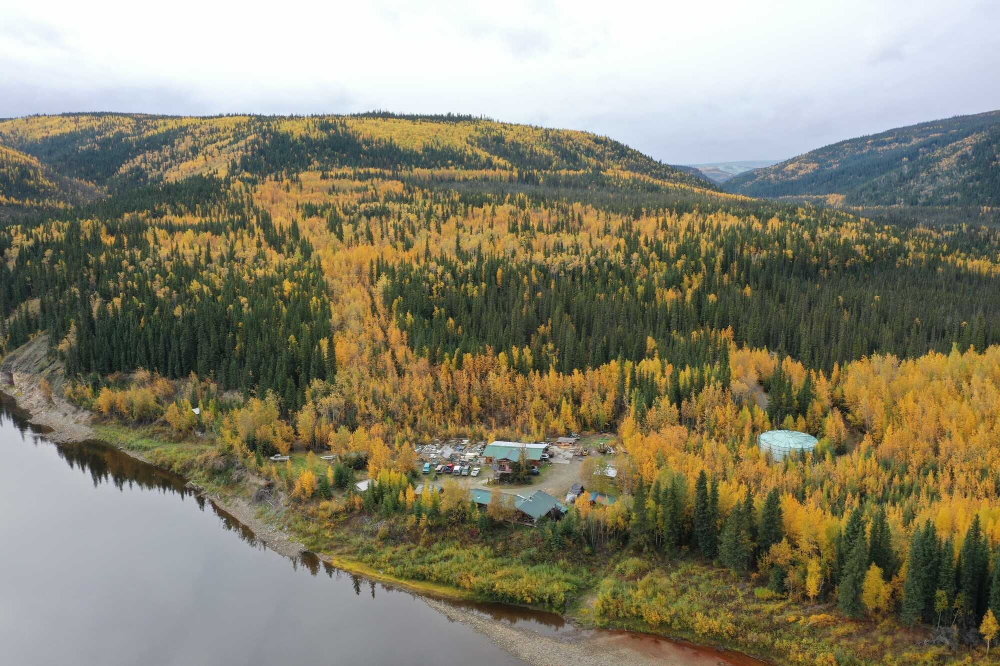 Log home, lodge/camp, guest cabins, & more situated on one mile of river frontage. 2