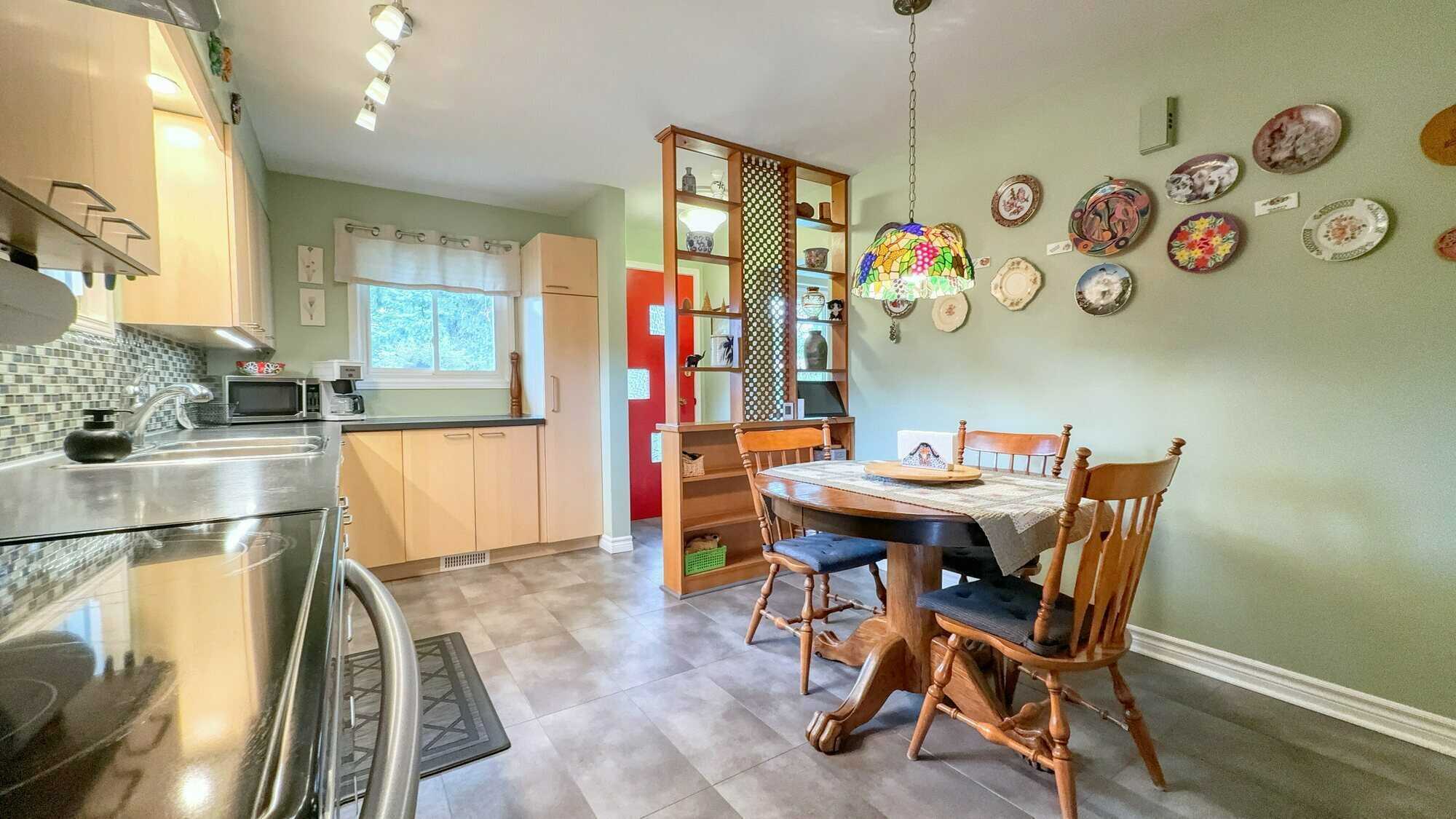 Centrally Located Bungalow with attached garage! 4