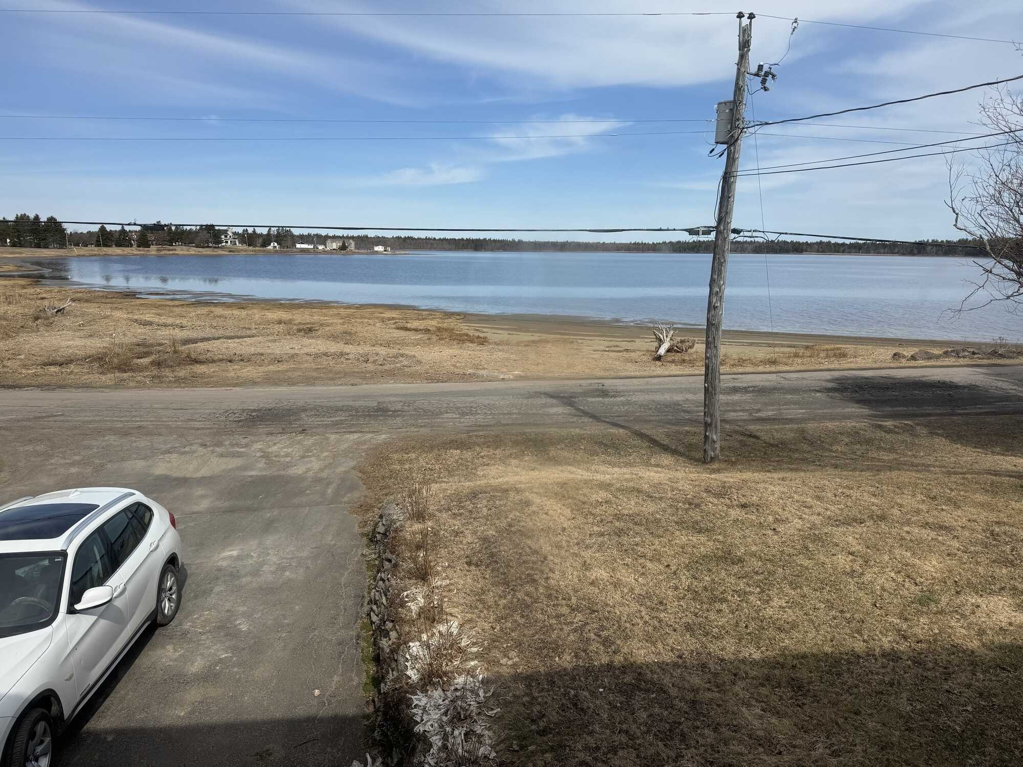By the Sea By the Sea Immaculate 3+1 Bedroom waterfront with Beach Access, Including potential mortgage helper income of $1,250/month 2