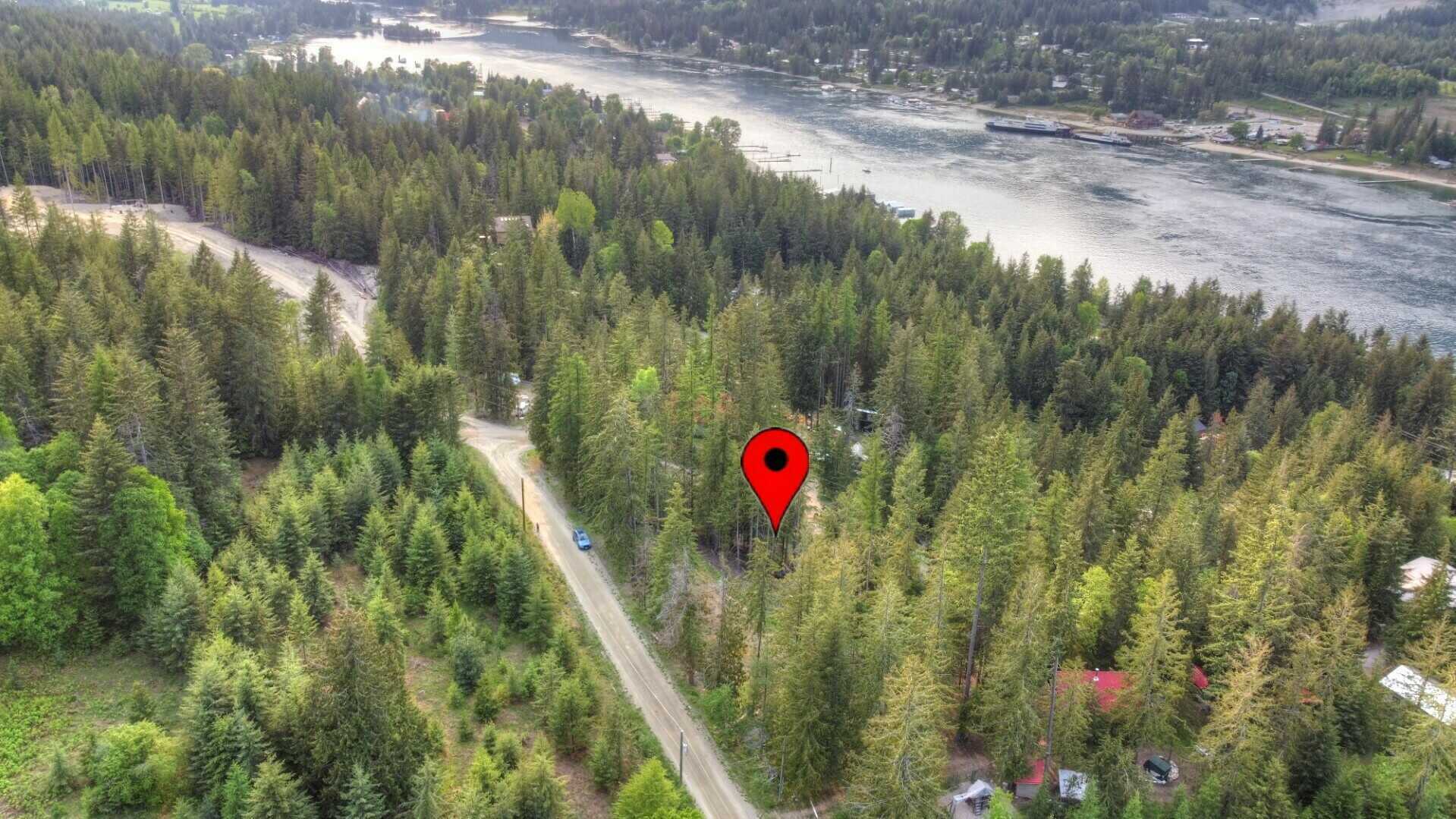 PROCTER!!  AMAZING VACANT LOT waiting for its new family!!  0.51 ACRES with EXCELLENT drilled well on site!  Awesome valley & mountain views with potential of a lake view! 3