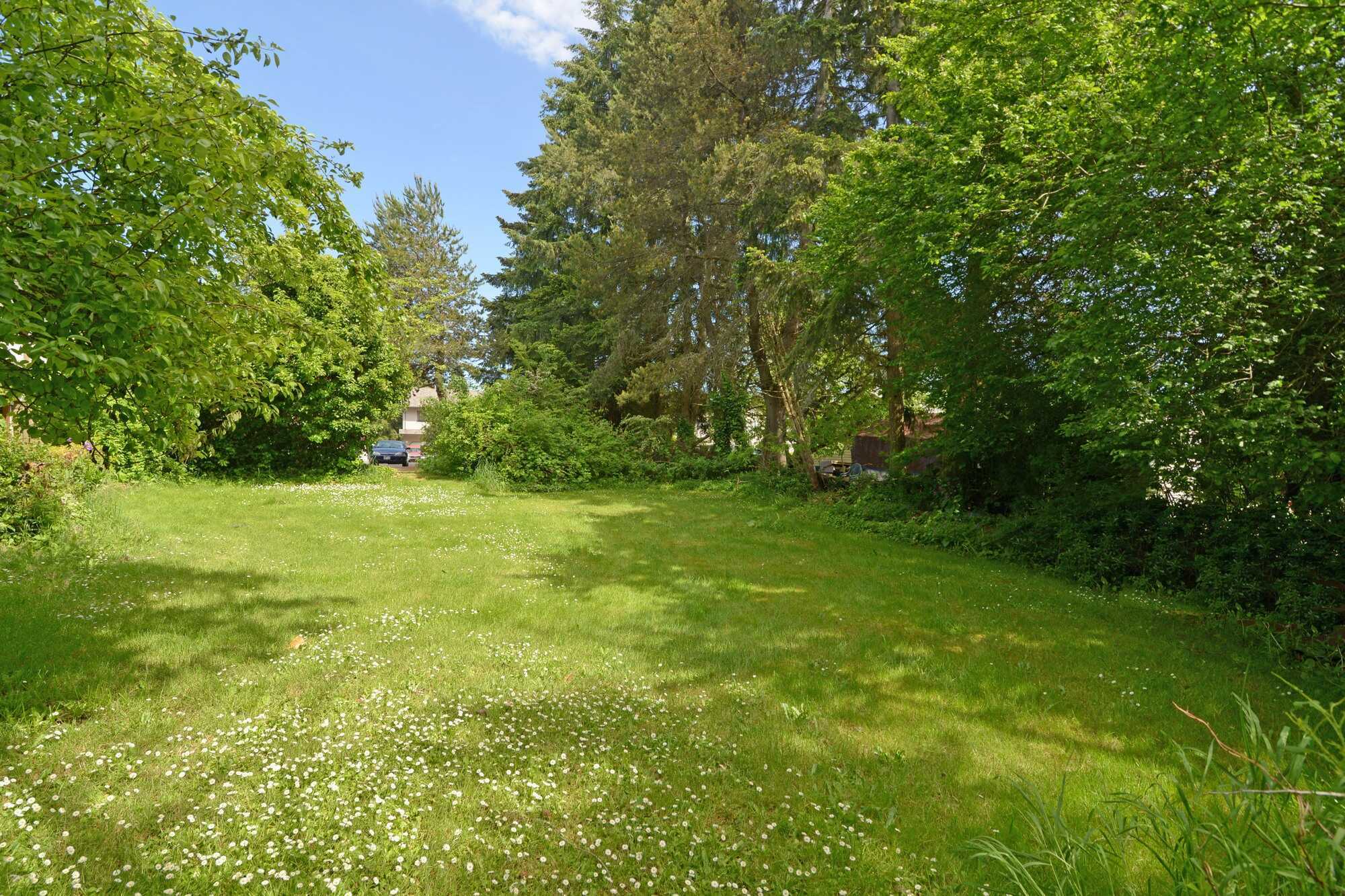 NEWLY PRICED ! 2 lots & 1 house assessed at $885,000.
NOW reduced to $750,000! 
Prime Opportunity to Build Multiple Homes on these Zone 5 High Density lots! Realtors welcome !  Located in Nanaimo BC this 3 bedroom 2 bathroom home is waiting for you ! 3