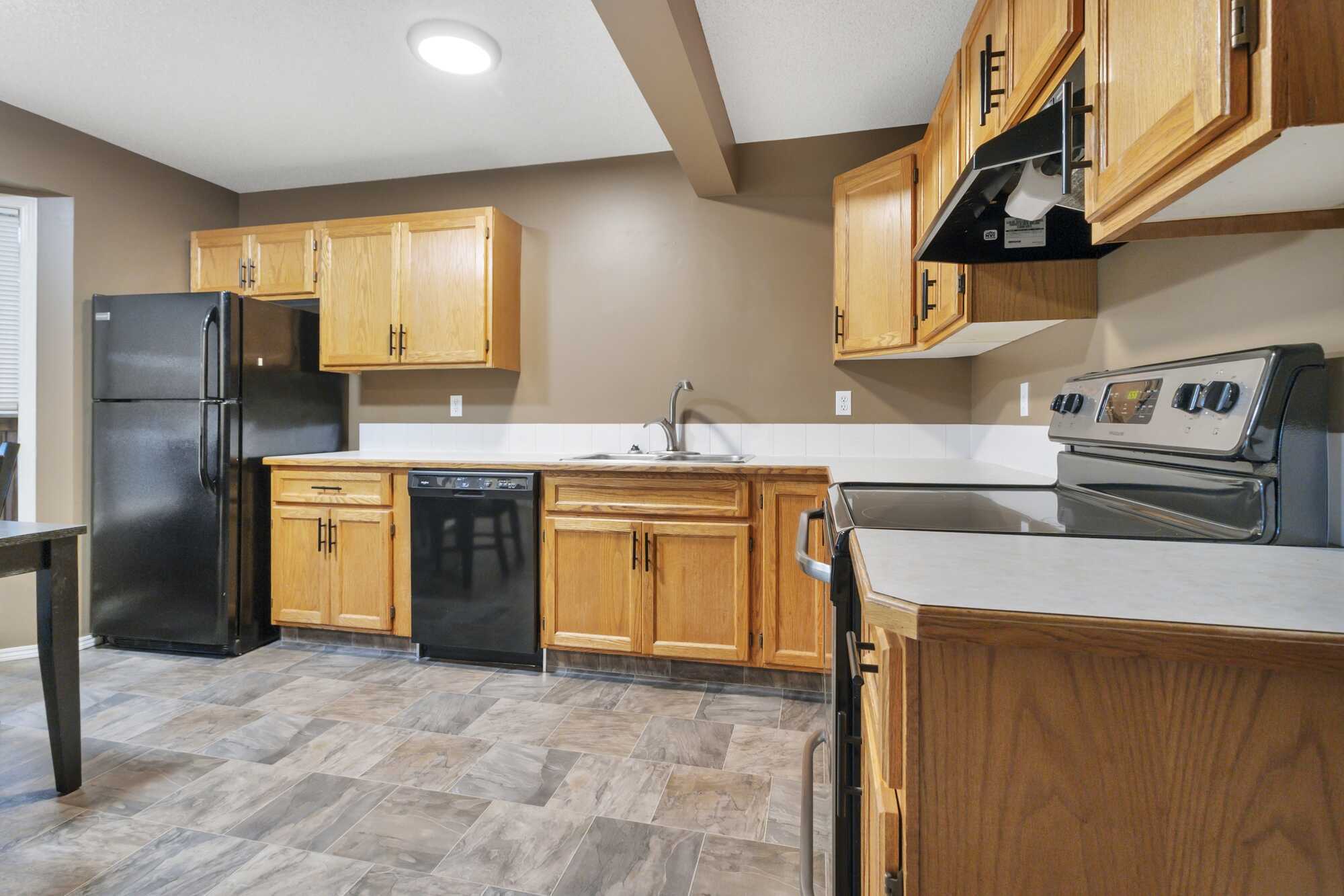 Immediate Possession ~ Fully Finished ~ End Unit Townhouse ~ No Condo Fees ~ In Red Deer 5