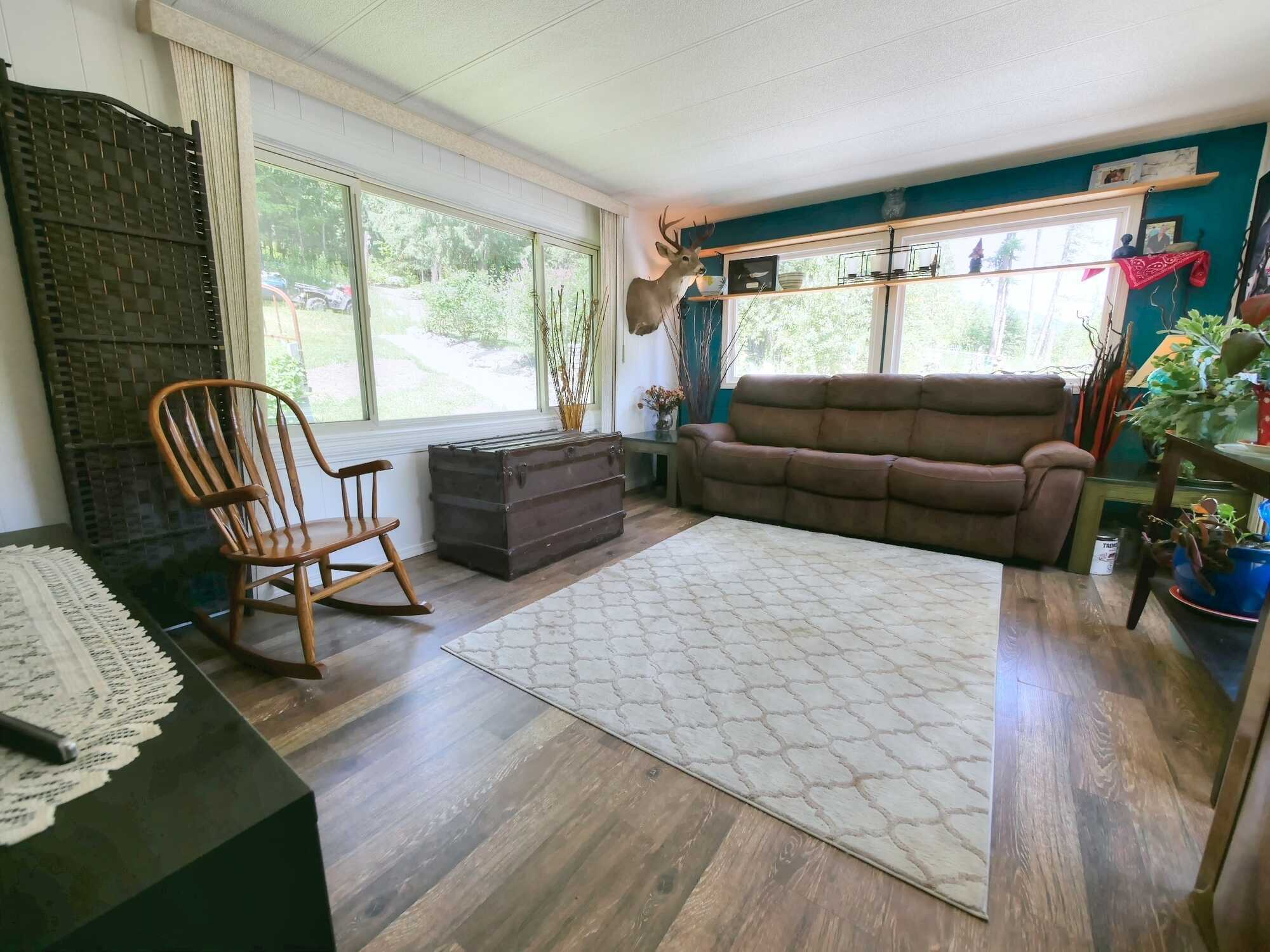 DIRECT CONTACT @  250-977-5898  * OFFERING $12,000 COMMISSION!!!!  Amazing Acreage! Nearly 10 Acres – Benched w/ Timber! 2Bed 1Bath Mobile home w/ Addition & 2 Level Deck! Landscaped! Opportunity to build your DREAM VIEW HOME! 5