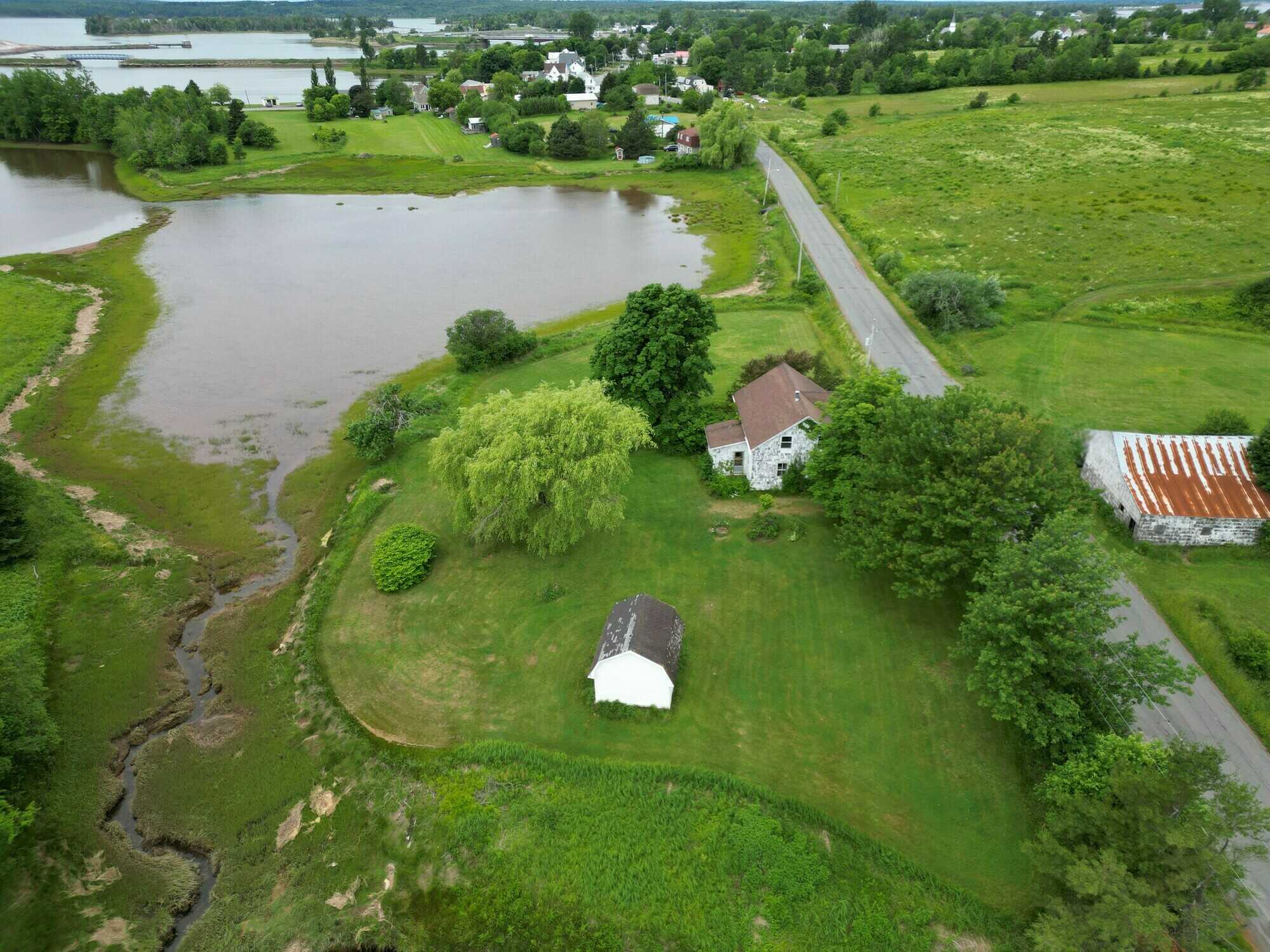 Rare opportunity to own a 0.95-acre waterfront lot in the heart of Pugwash! 3