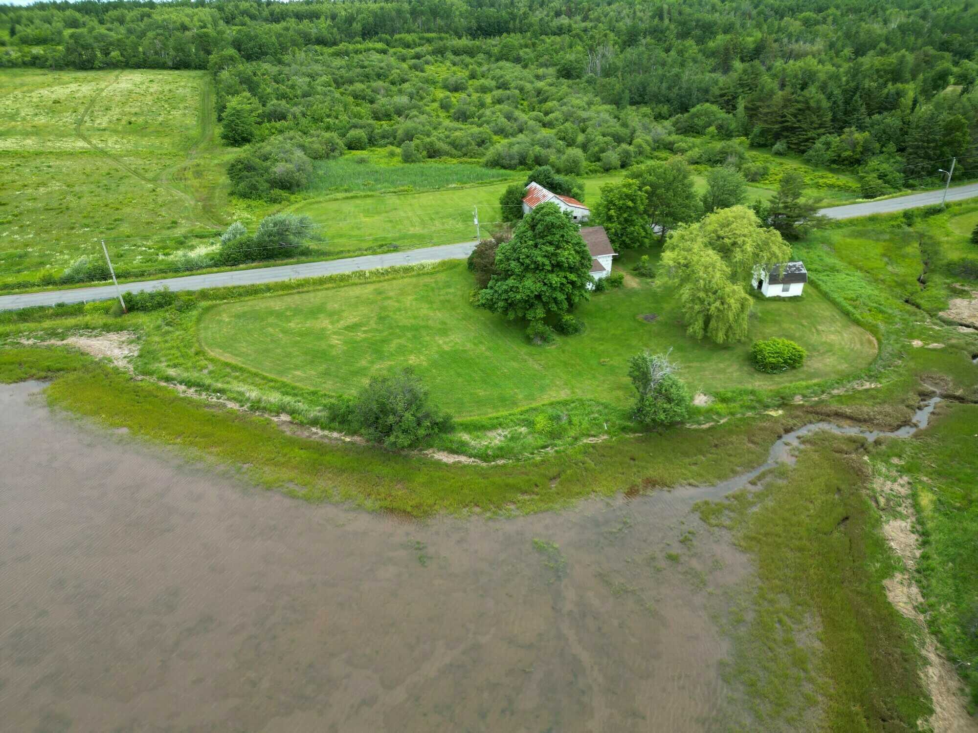 Rare opportunity to own a 0.95-acre waterfront lot in the heart of Pugwash! 2