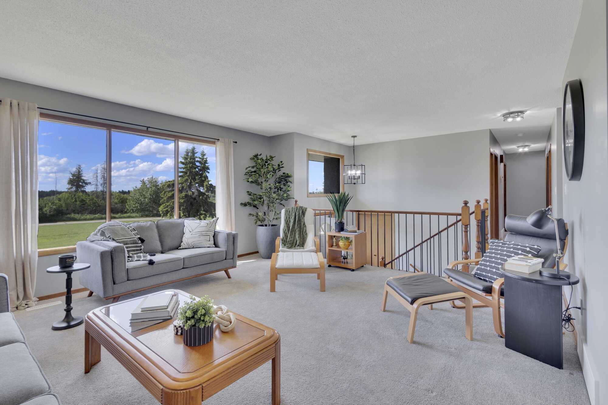 Walk-out Bi-Level ~ Heated Double Detached Garage & Carport ~ A/C ~ Recent Updates ~ In Sought After West Park Estates ~ Across From The Trails & River 4