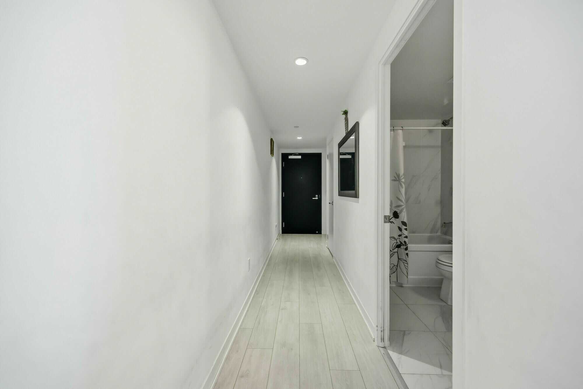 Bright Corner Unit with Rare Tandem Parking | 2+1 Bed at Southside Condos 5