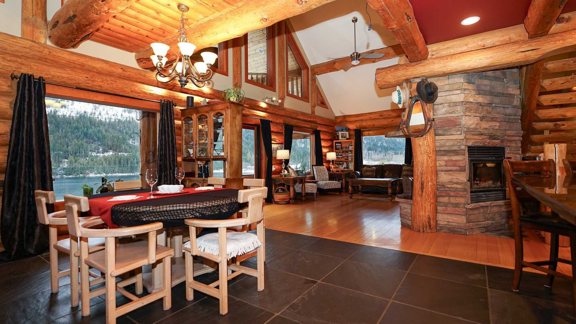 A breathtaking lakefront log cabin on Adams Lake. Custom built and thoughtfully designed, this exceptional home sits on 0.53 acres and offers 3,190 sq ft of beautifully crafted living space, blending rustic character with refined comfort. 3