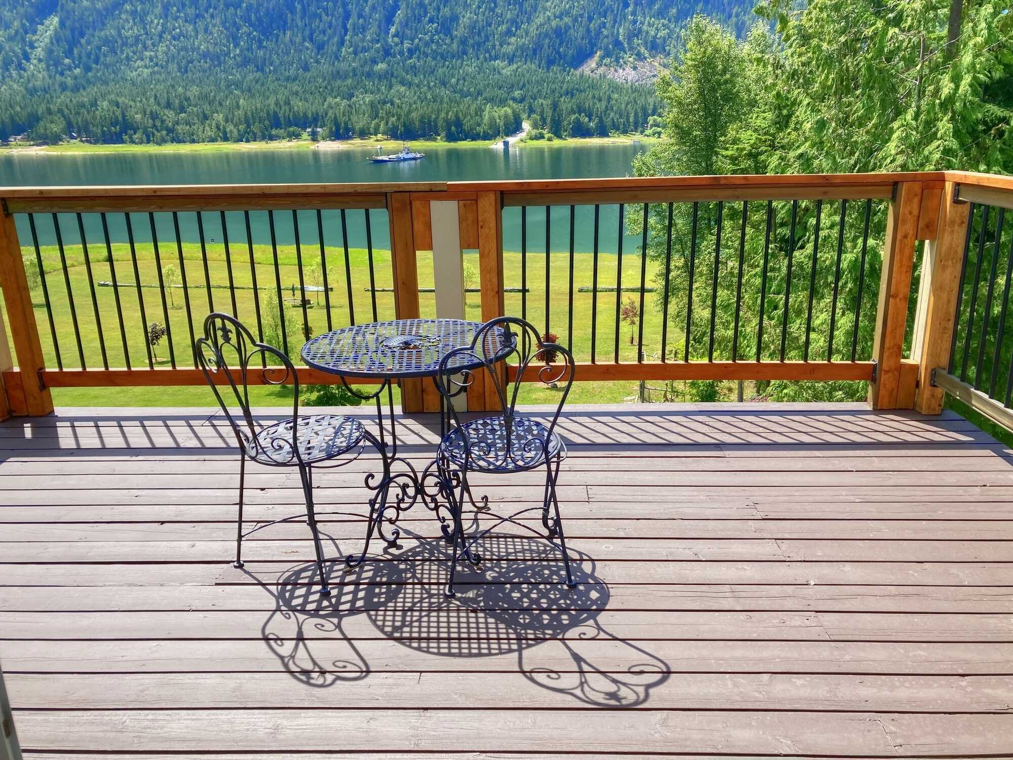 SPECTACULAR LAKE & MOUNTAIN VIEWS AT THE DOOR STEP! 3Bed 1.5Bath Lakehouse! 300ft of Waterfront! Beautiful Deck! Balcony! Over 3Acres of absolute privacy & beautifully landscaped! Private beach! Boat Launch access 5