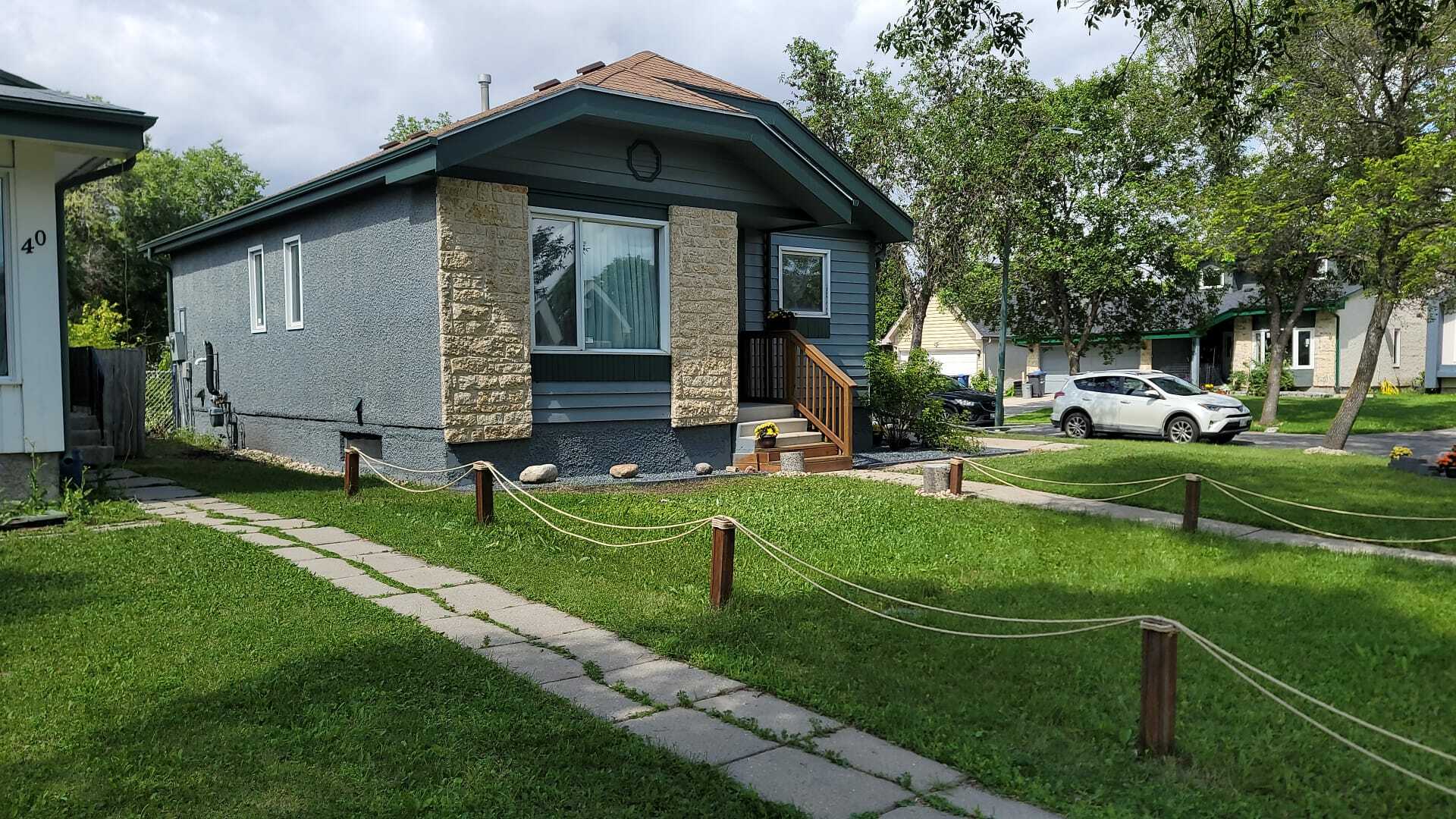 Beautiful Corner Property at 36 Queensbury Bay, Winnipeg — Perfect Family Home or Investment Opportunity! 3
