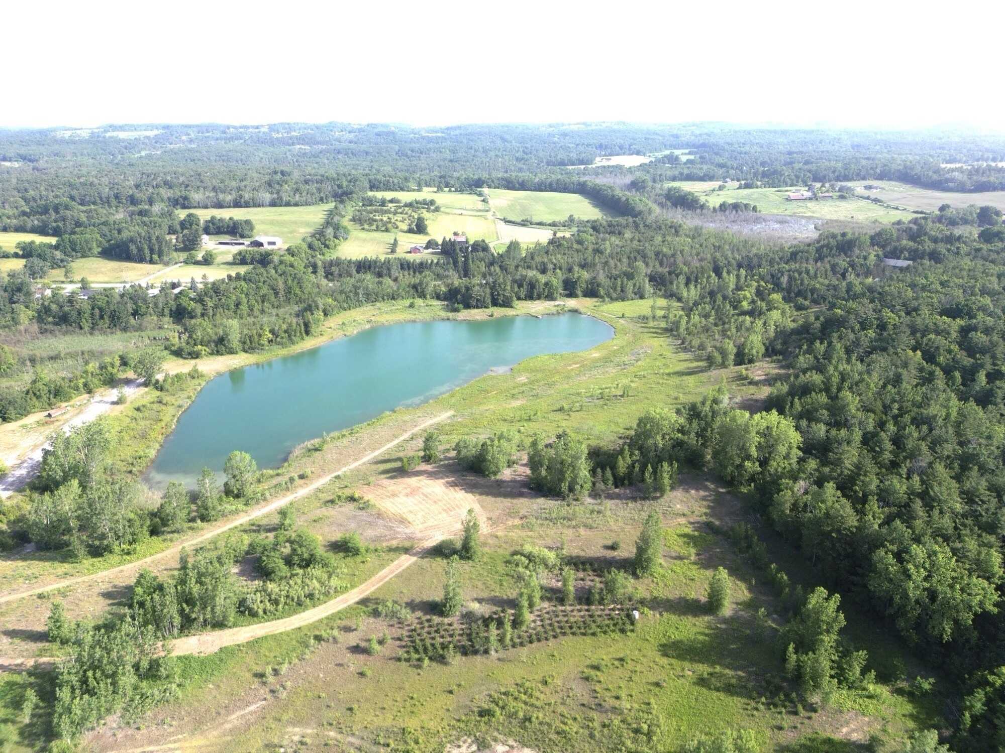 Prime 60 acres of pure potential just outside Brighton! Featuring a stunning 6-acre pond, rolling terrain, and multiple prime build sites, this peaceful retreat offers endless possibilities for your dream home with city convenience just minutes away. 4